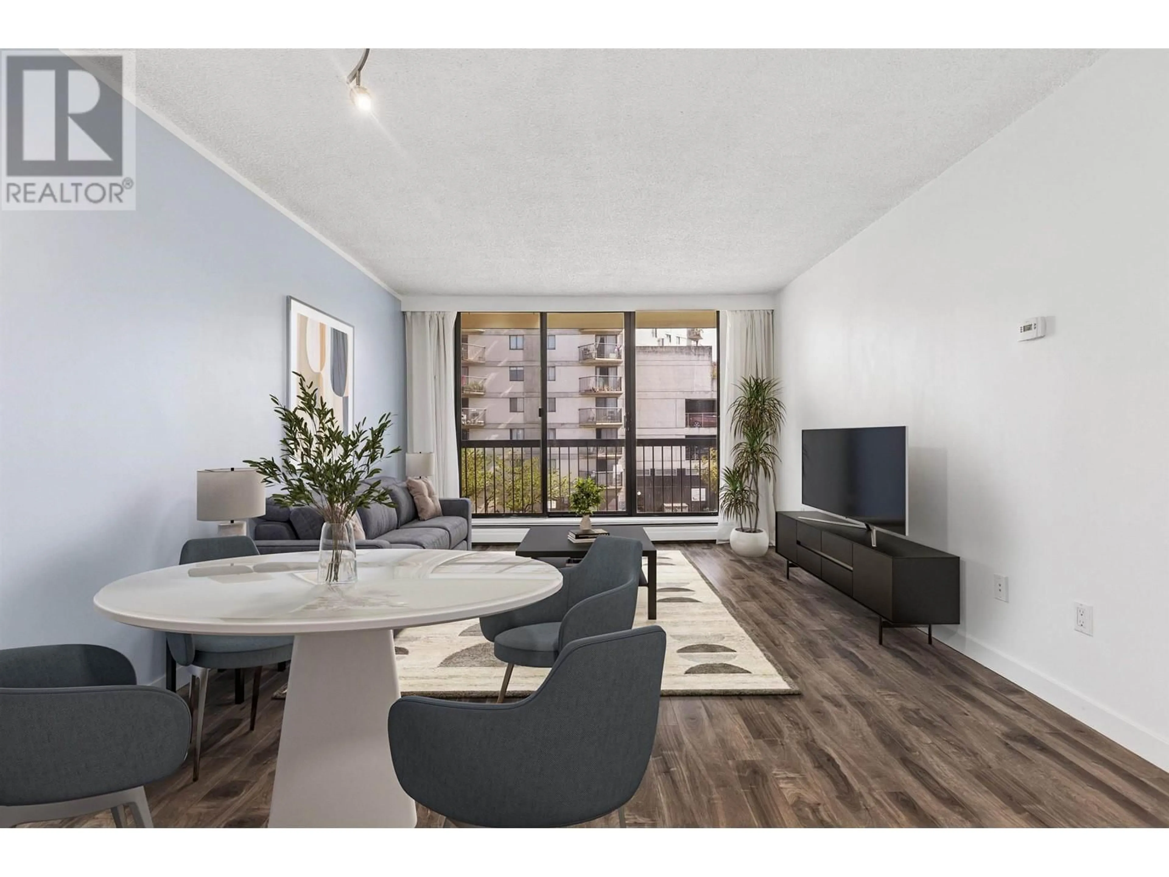 Living room with furniture, wood/laminate floor for 304 - 145 ST. GEORGES AVENUE, North Vancouver British Columbia V7L3G8