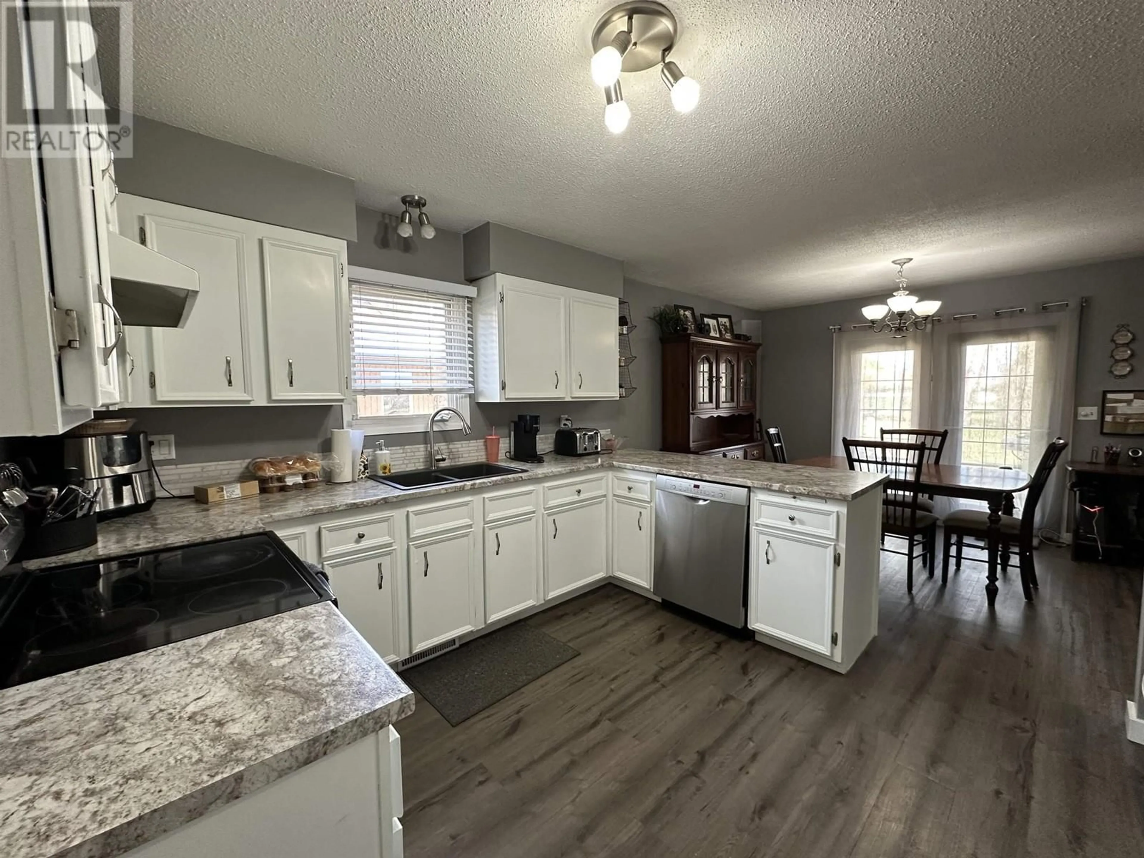 Open concept kitchen, unknown for 10650 102 STREET, Fort St. John British Columbia V1J4X7