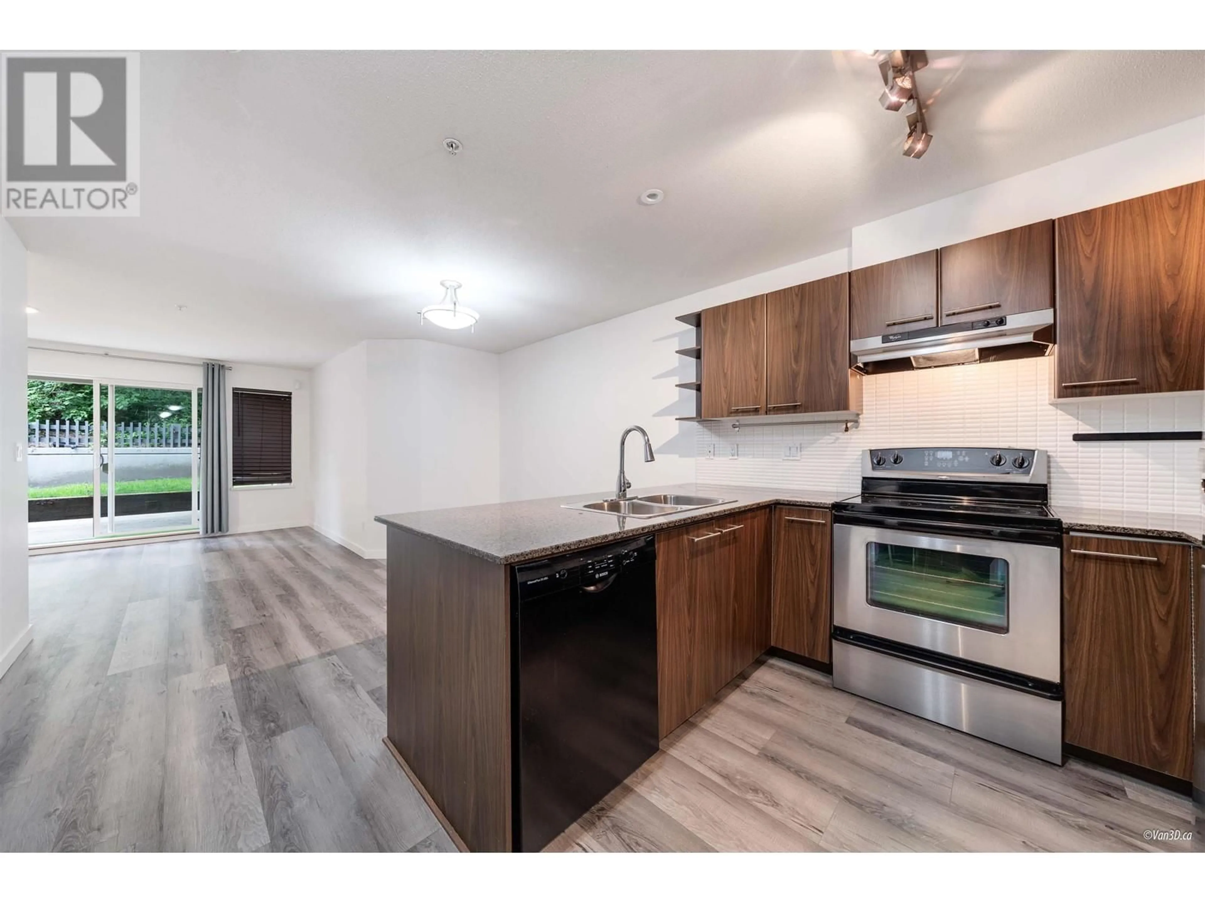 Open concept kitchen, wood/laminate floor for 212 - 4799 BRENTWOOD DRIVE, Burnaby British Columbia V5C0C4