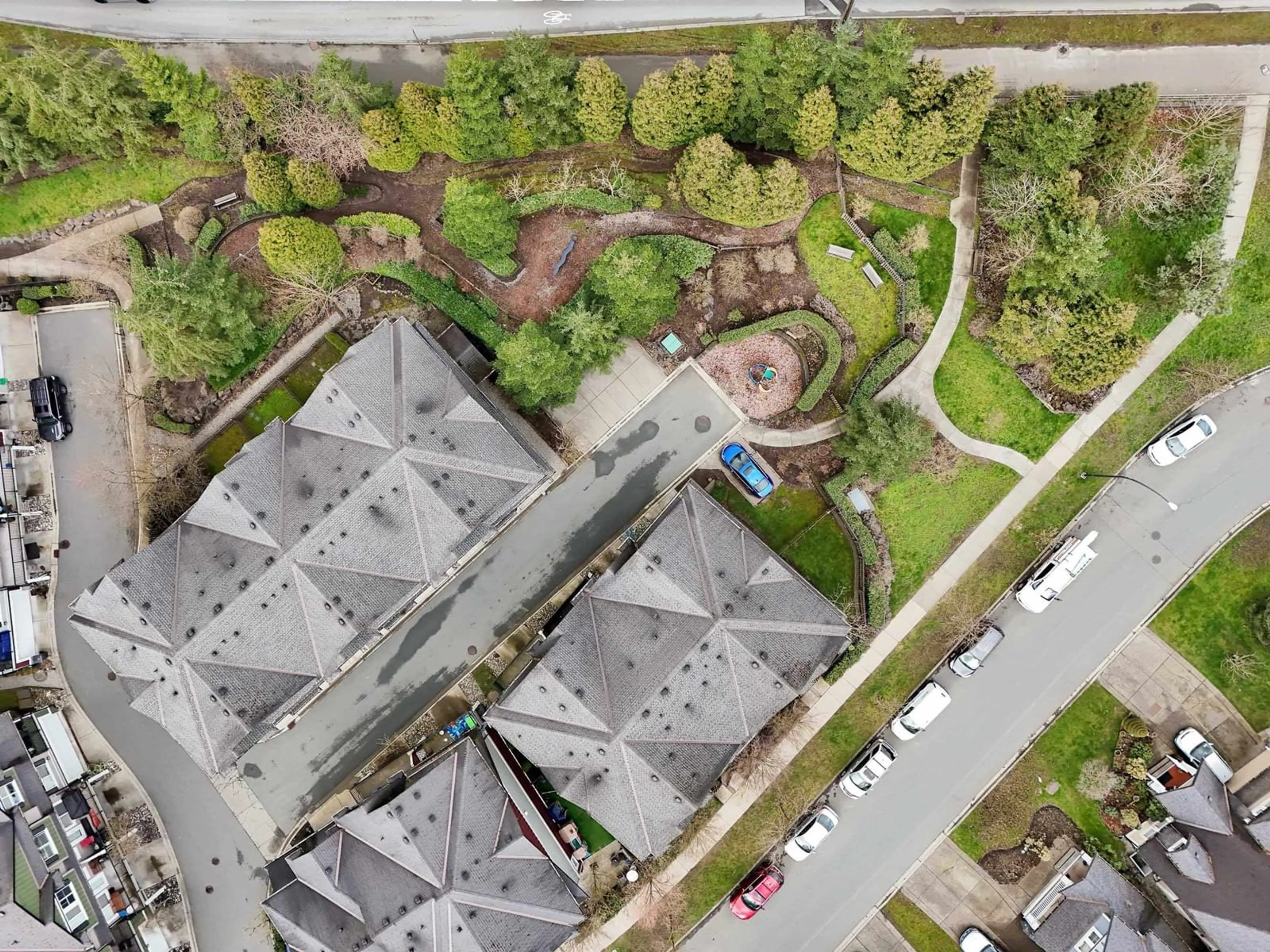 A pic from outside/outdoor area/front of a property/back of a property/a pic from drone, street for 7 - 18211 70, Surrey British Columbia V3S8K9