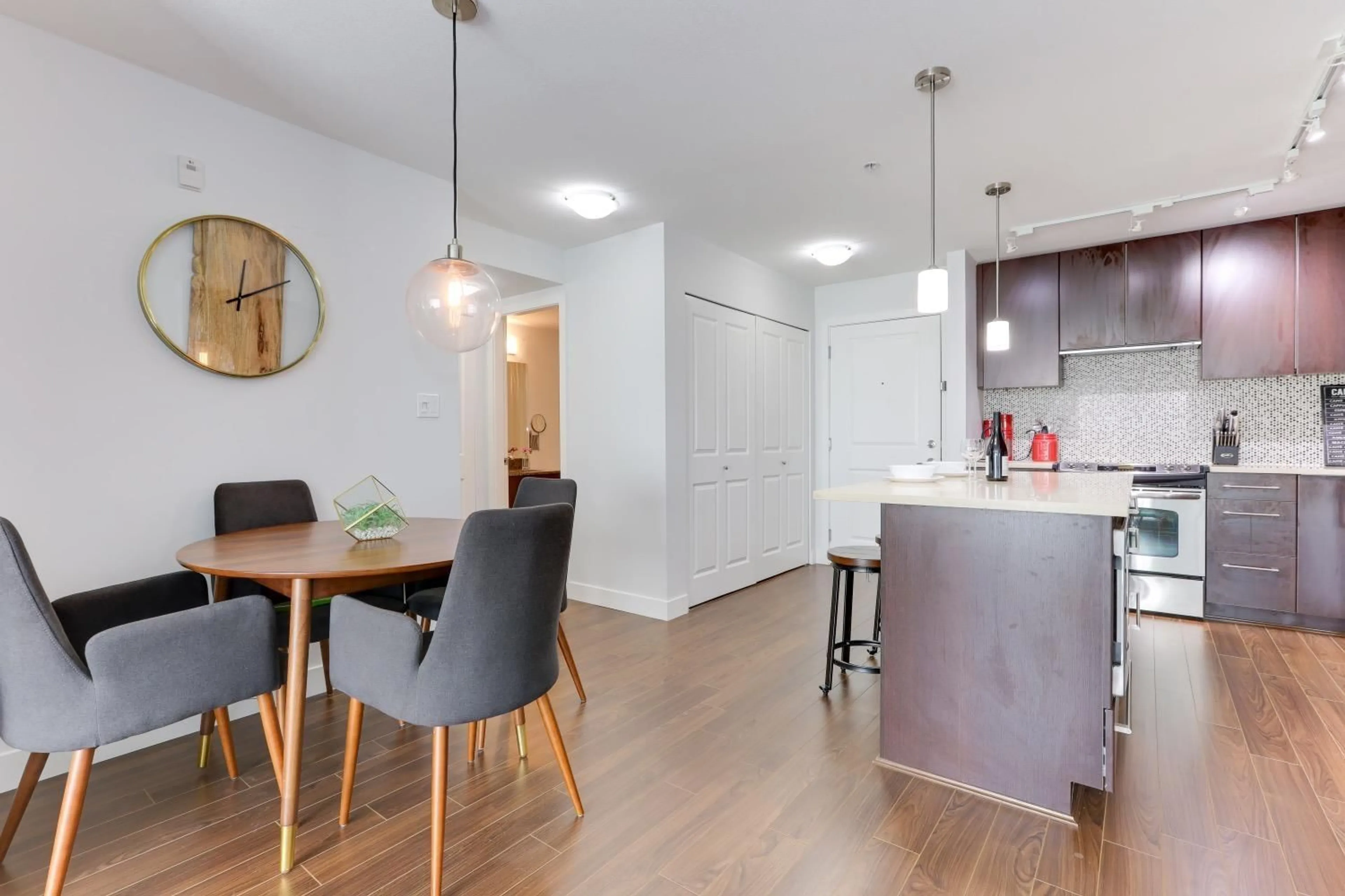 Open concept kitchen, wood/laminate floor for 317 - 15745 CROYDON, Surrey British Columbia V3S2L5