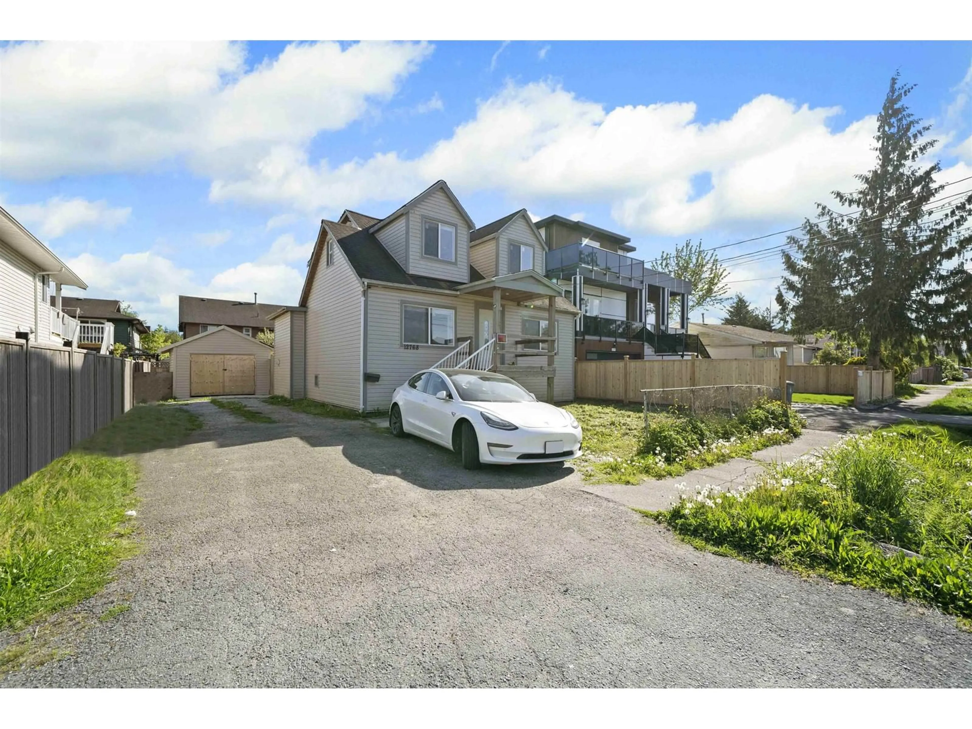 A pic from outside/outdoor area/front of a property/back of a property/a pic from drone, street for 12768 114A, Surrey British Columbia V3V3P4