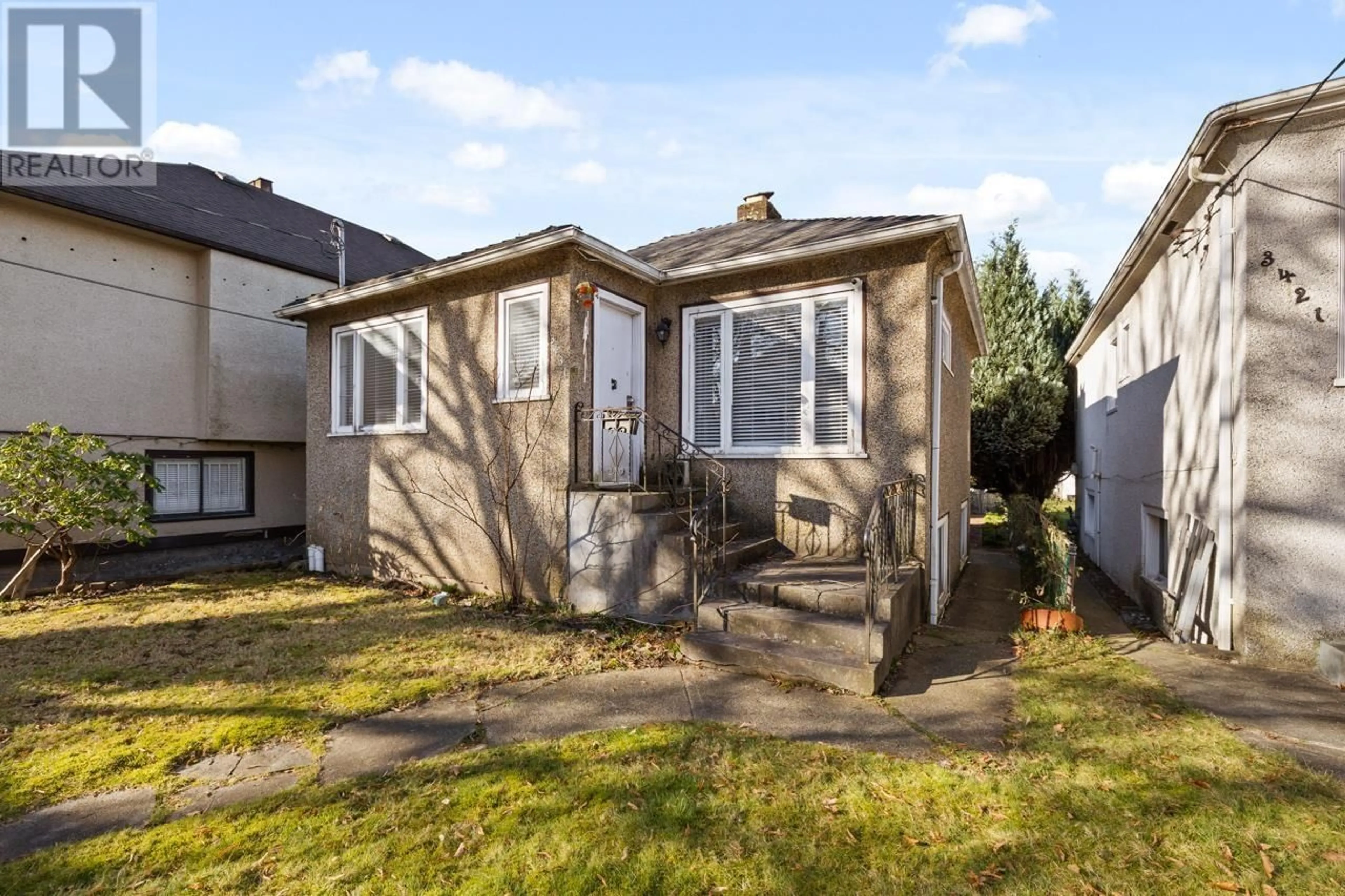 Home with vinyl exterior material, street for 3431 GLEN DRIVE, Vancouver British Columbia V5V4S5