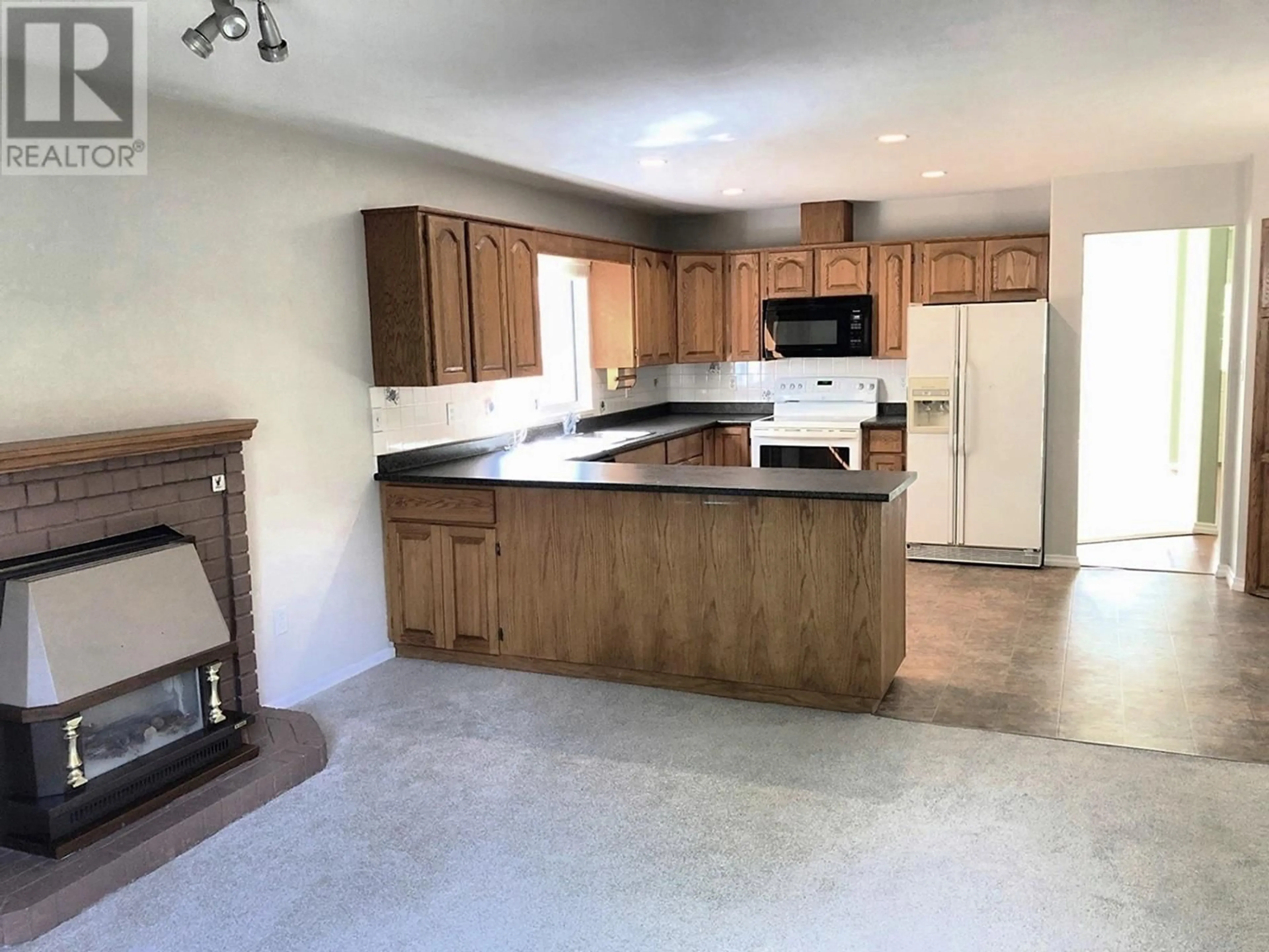 Open concept kitchen, ceramic/tile floor for 22965 125A AVENUE, Maple Ridge British Columbia V2X0S6
