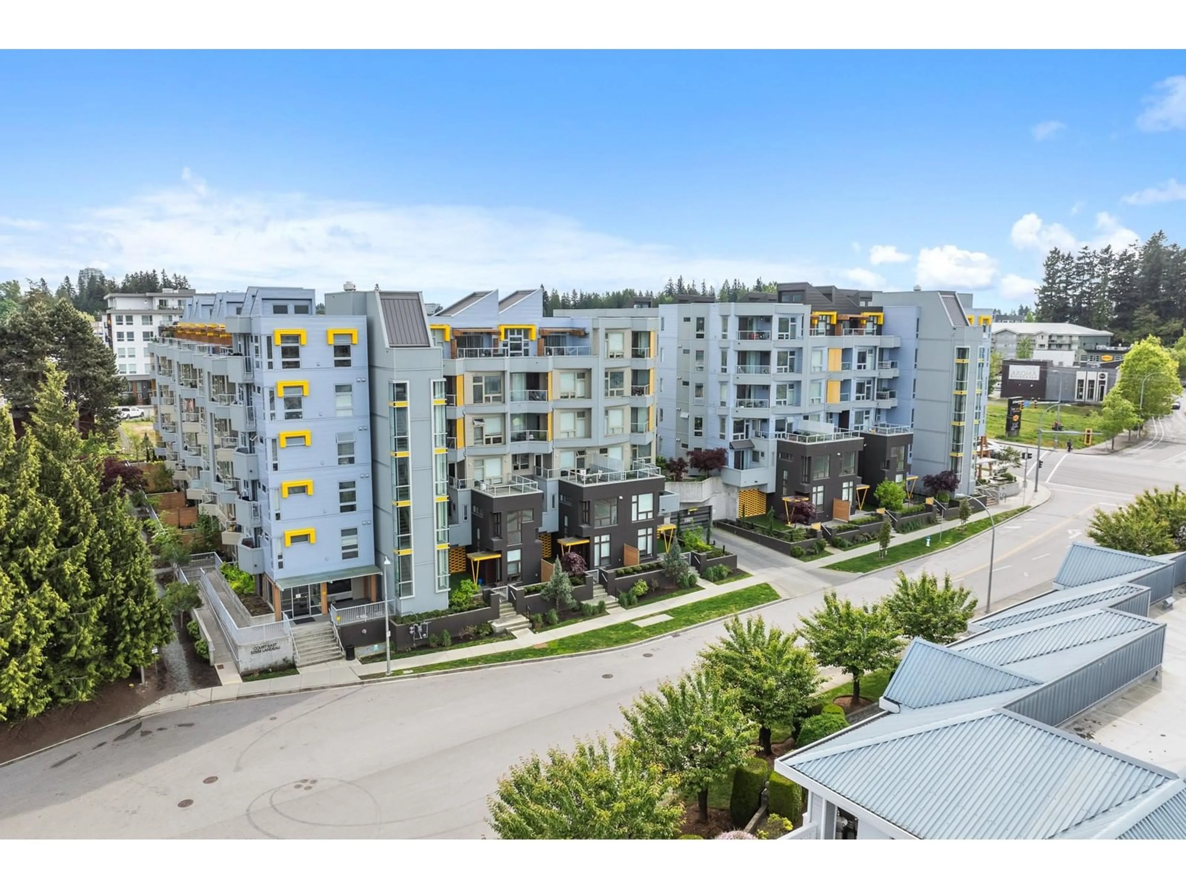 A pic from outside/outdoor area/front of a property/back of a property/a pic from drone, city buildings view from balcony for 502 - 32838 LANDEAU, Abbotsford British Columbia V2S0M6