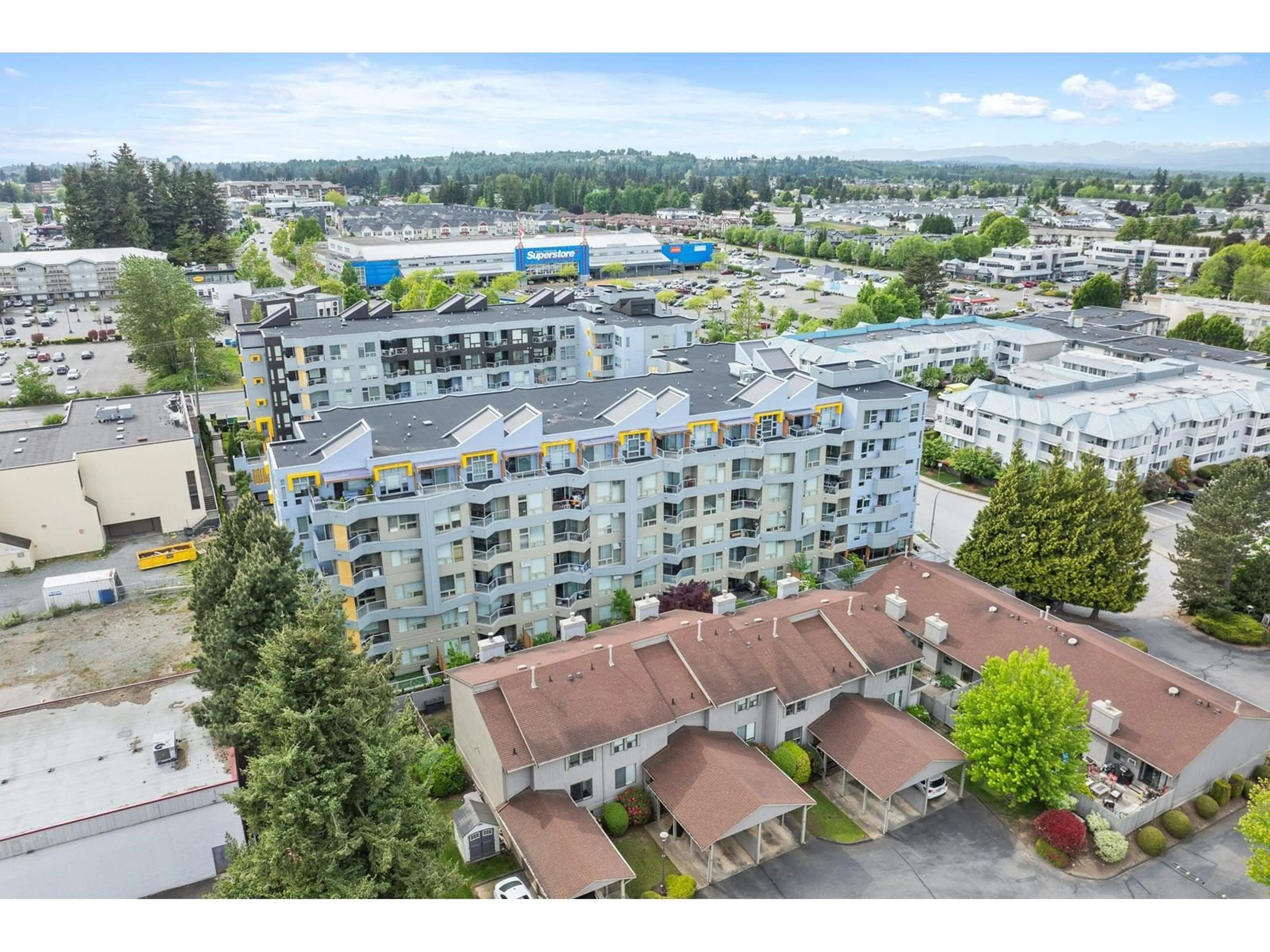 A pic from outside/outdoor area/front of a property/back of a property/a pic from drone, city buildings view from balcony for 502 - 32838 LANDEAU, Abbotsford British Columbia V2S0M6