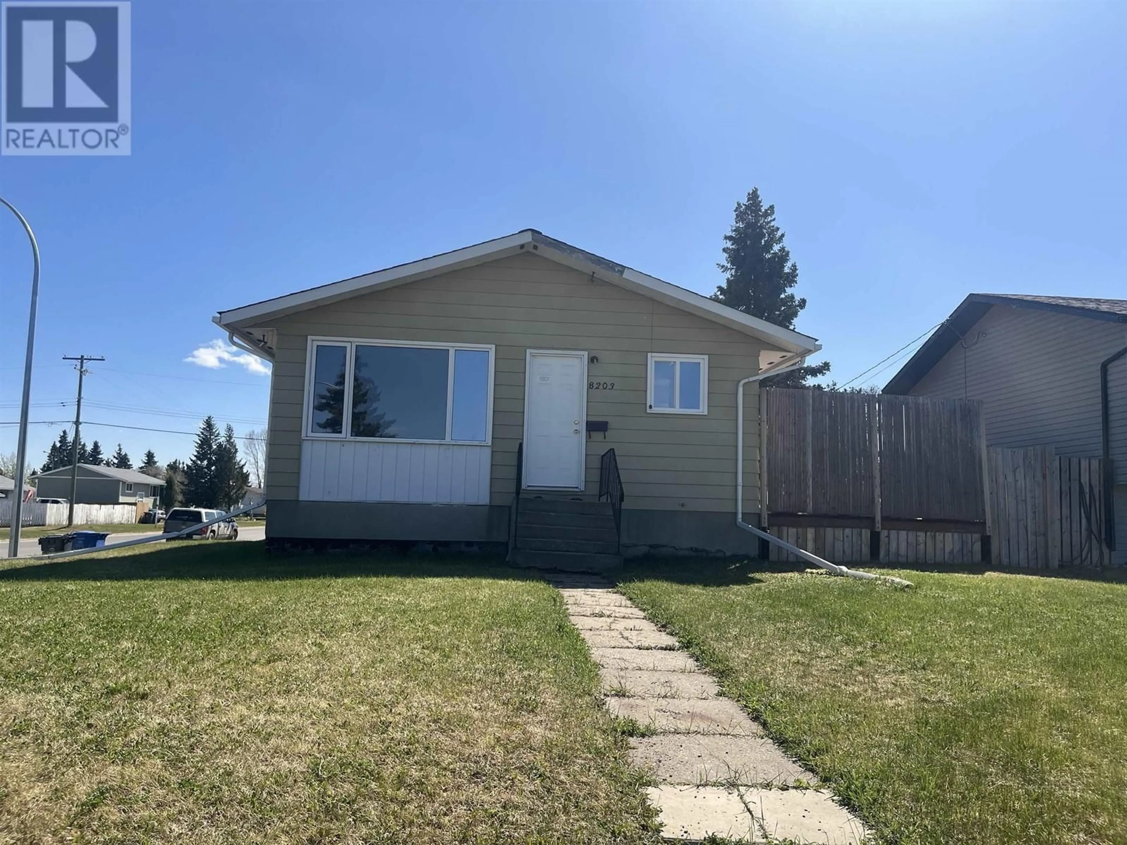 Home with vinyl exterior material, street for 8203 96 AVENUE, Fort St. John British Columbia V1J1J7