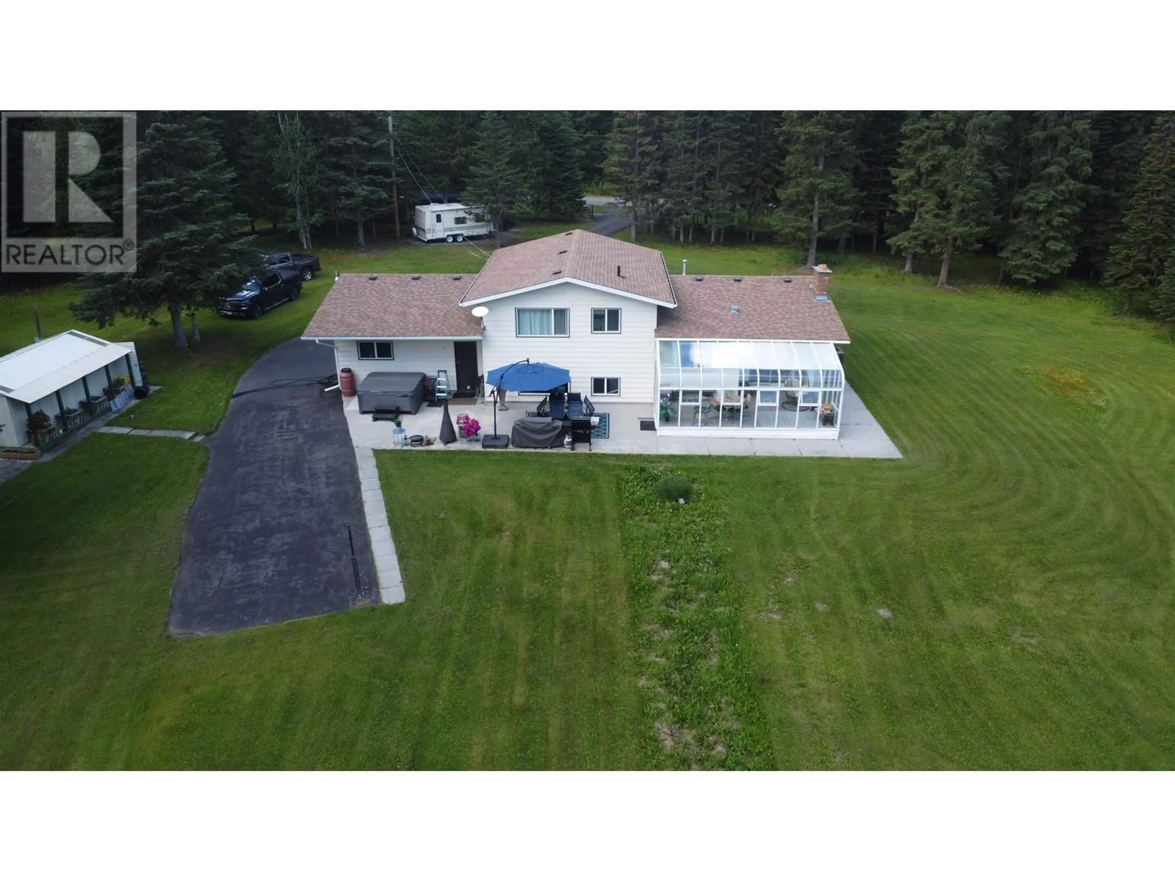 A pic from outside/outdoor area/front of a property/back of a property/a pic from drone, unknown for 3955 SUNSHINE CRESCENT, Prince George British Columbia V2N5Y2