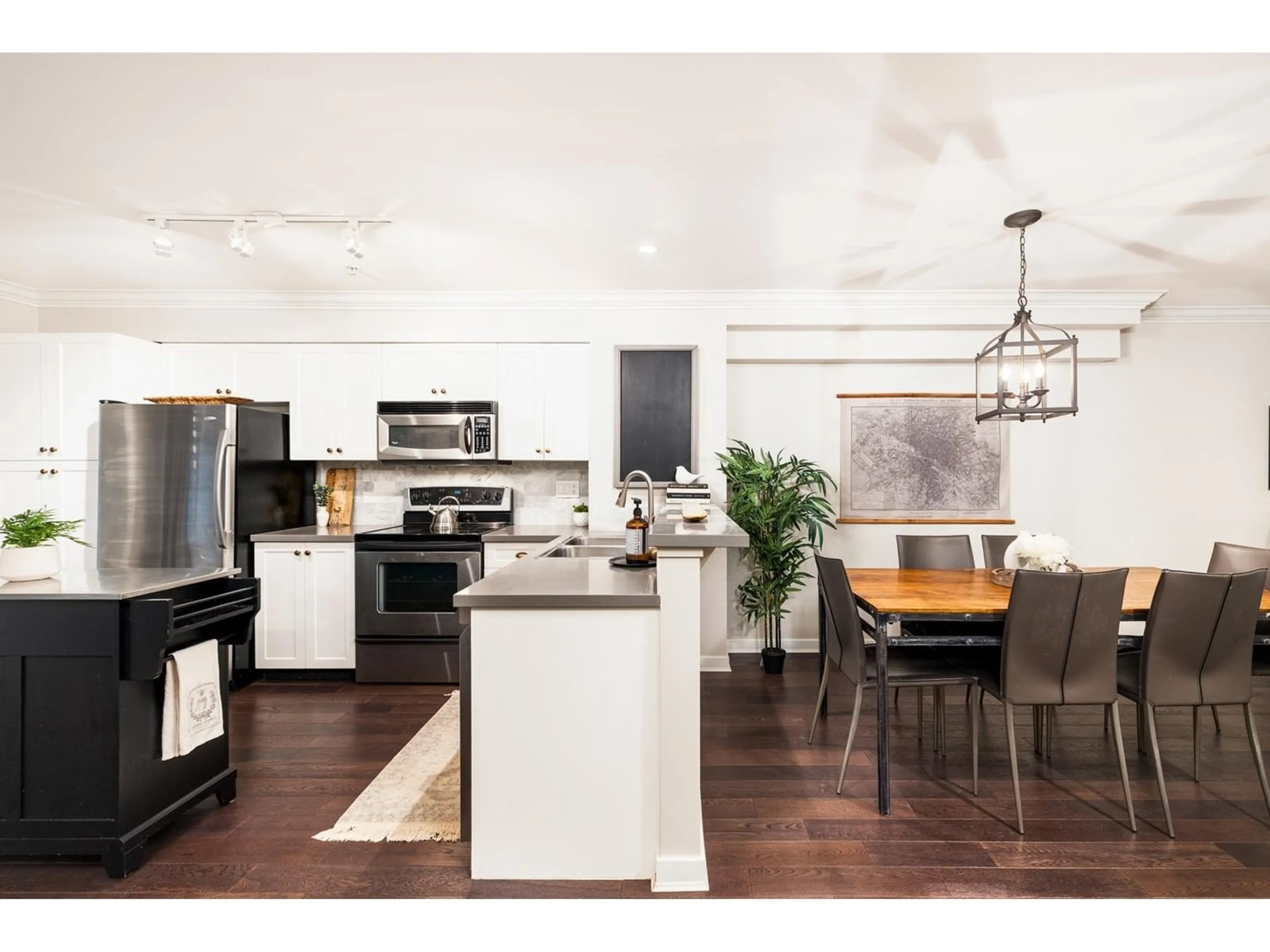 Open concept kitchen, wood/laminate floor for 107 - 12040 68, Surrey British Columbia V3W1P5