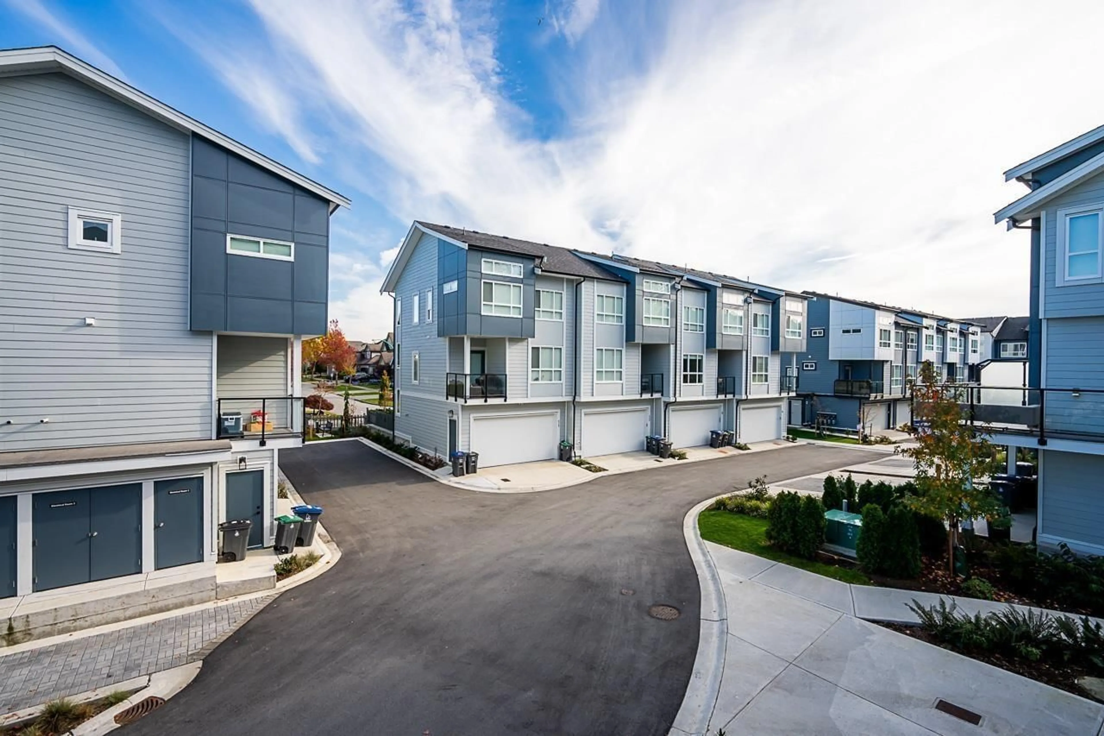 A pic from outside/outdoor area/front of a property/back of a property/a pic from drone, street for 10 - 7050 188, Surrey British Columbia V4N3G6