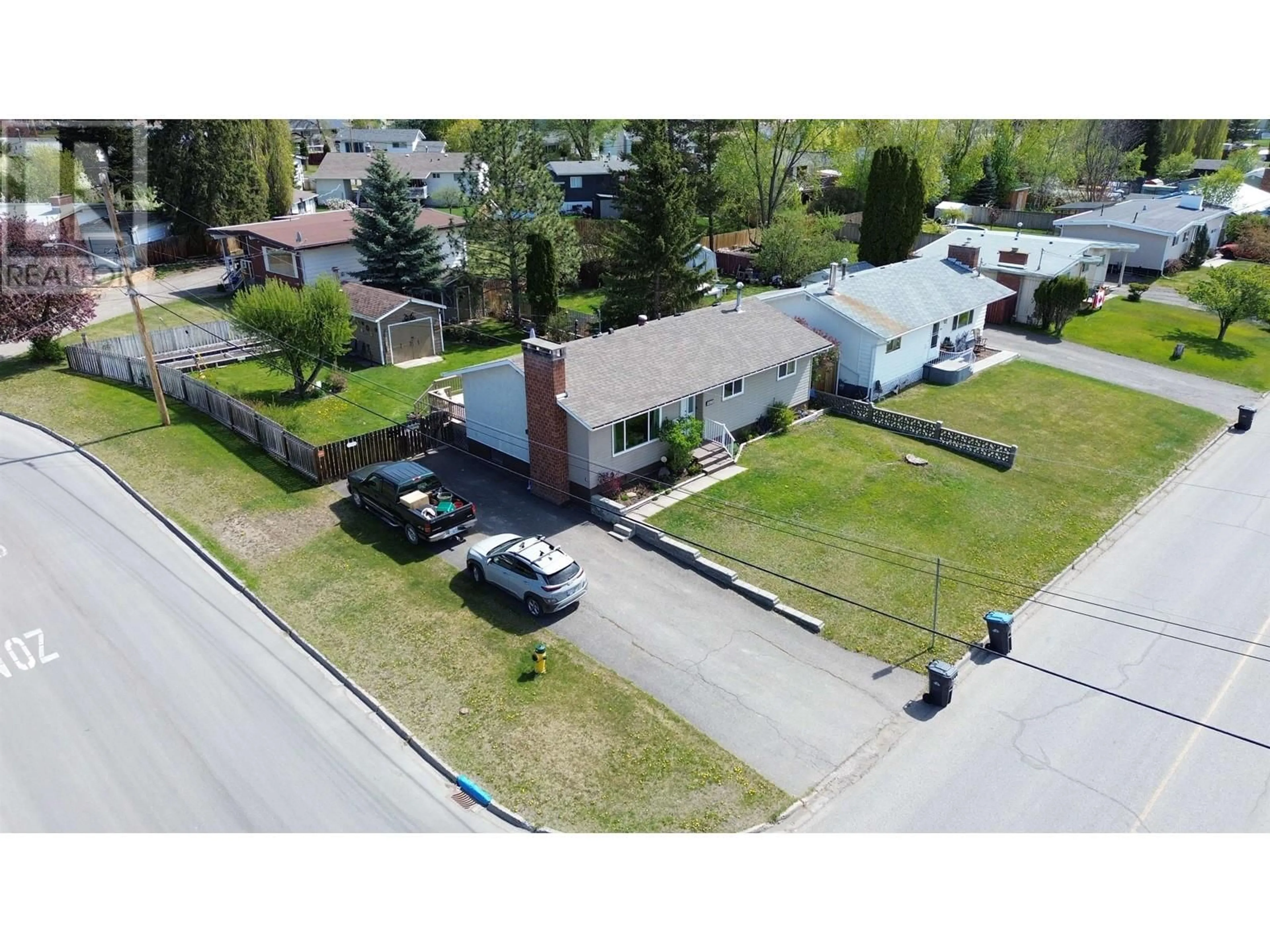 A pic from outside/outdoor area/front of a property/back of a property/a pic from drone, street for 1090 WESTERN AVENUE, Williams Lake British Columbia V2G2J6