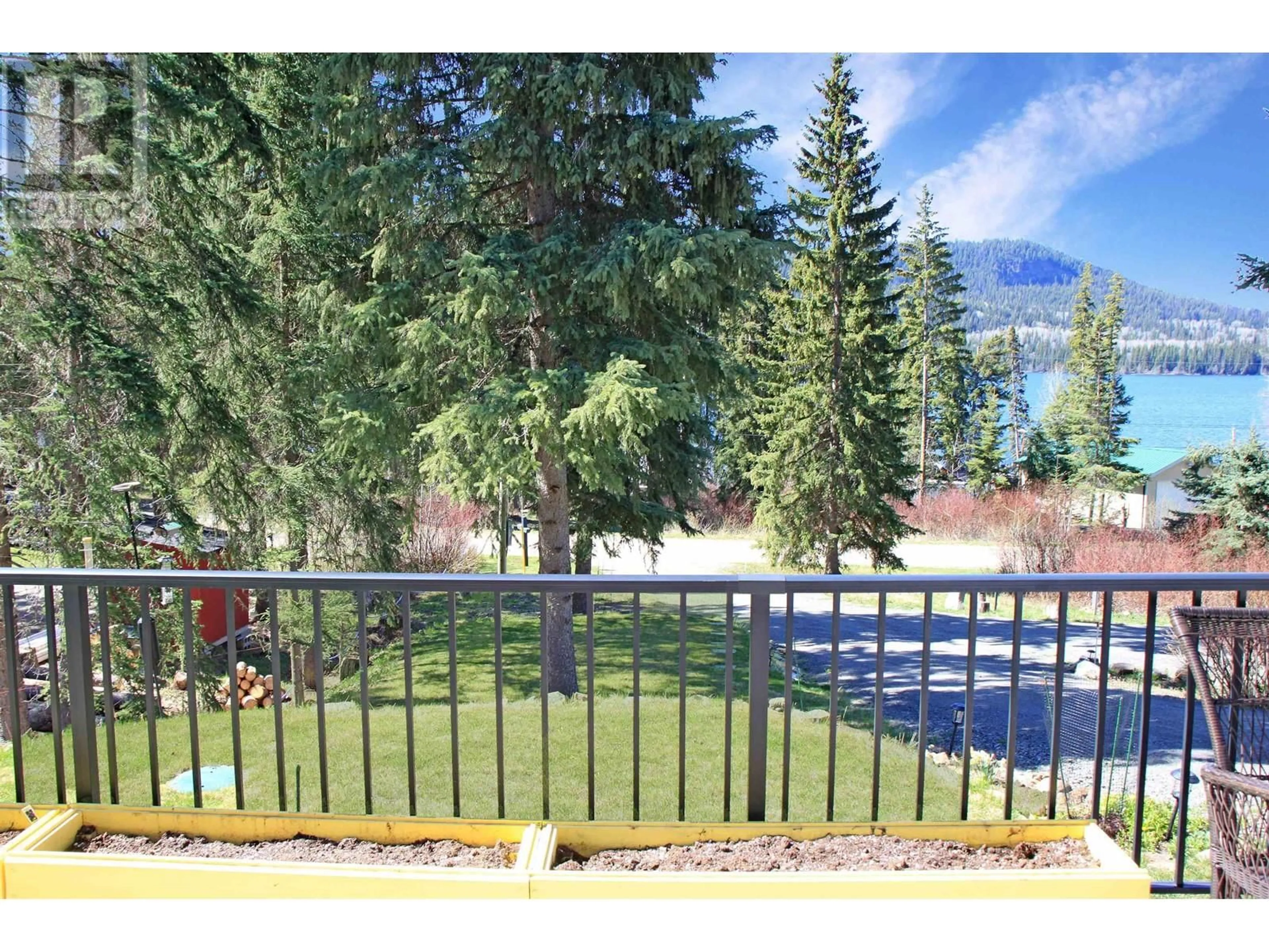 A pic from outside/outdoor area/front of a property/back of a property/a pic from drone, water/lake/river/ocean view for 8659 BOULTBEE ROAD, Bridge Lake British Columbia V0K1E0