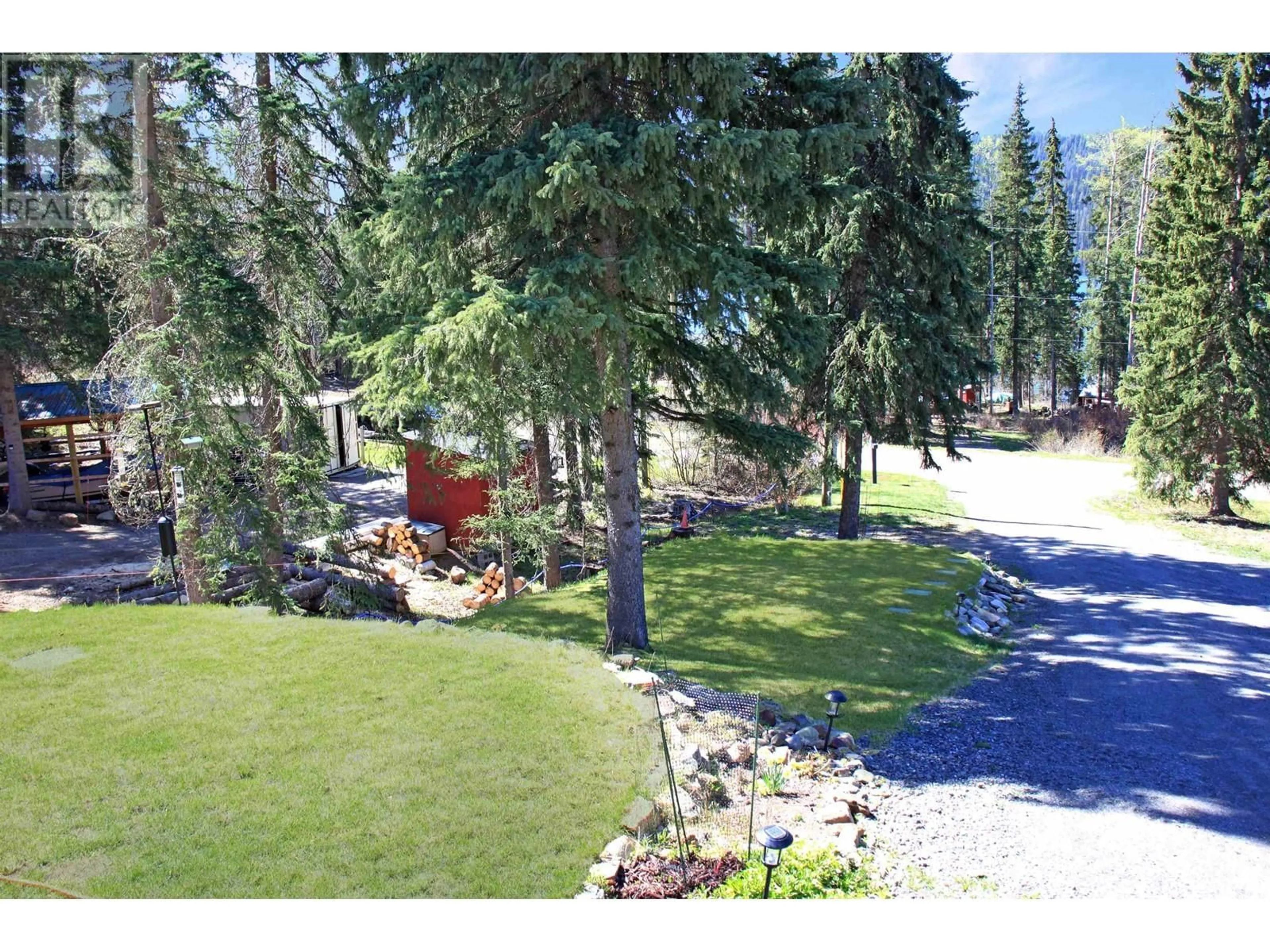 A pic from outside/outdoor area/front of a property/back of a property/a pic from drone, forest/trees view for 8659 BOULTBEE ROAD, Bridge Lake British Columbia V0K1E0