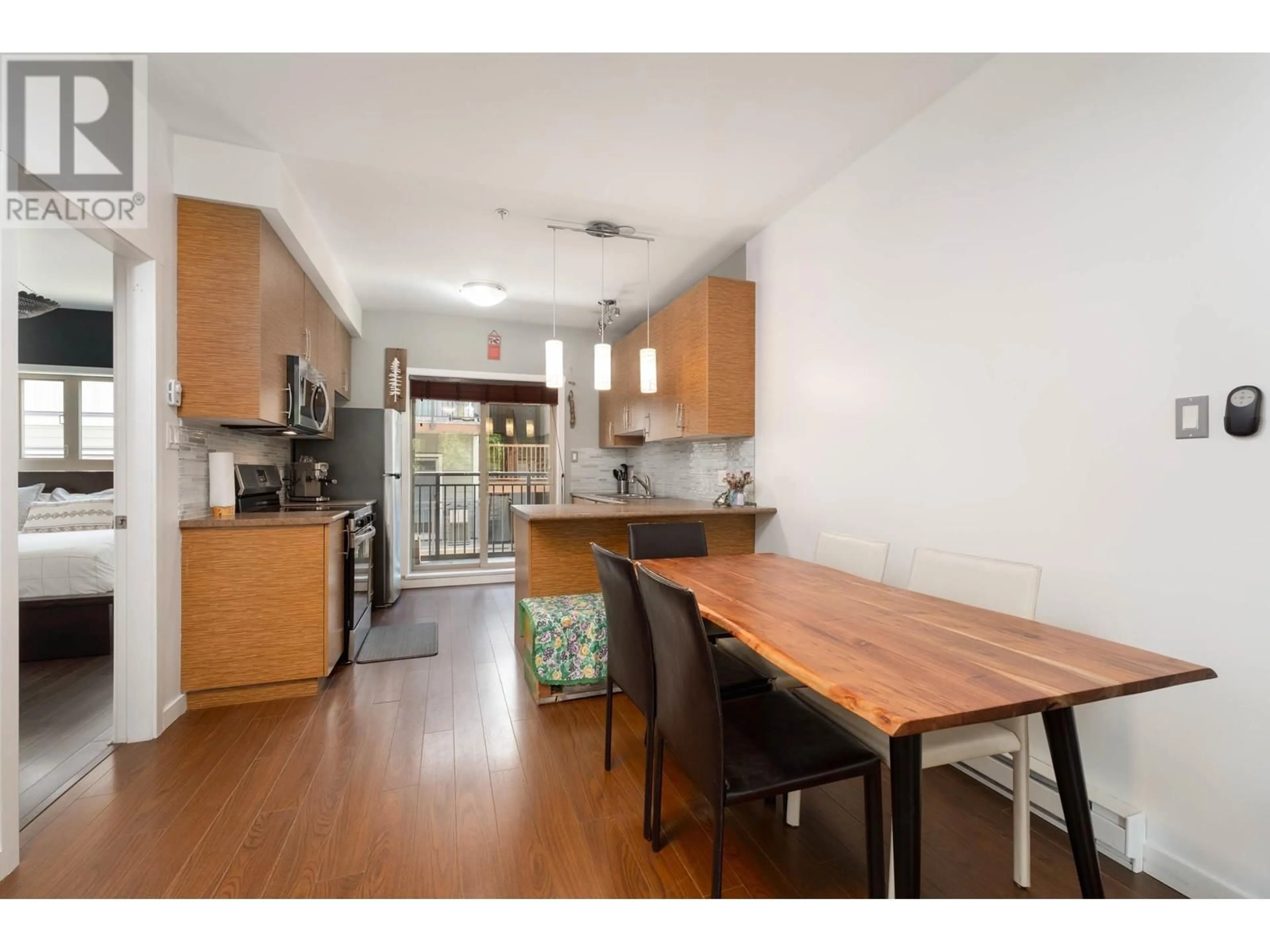 Open concept kitchen, wood/laminate floor for 2 - 7450 PROSPECT STREET, Pemberton British Columbia V0N2L1