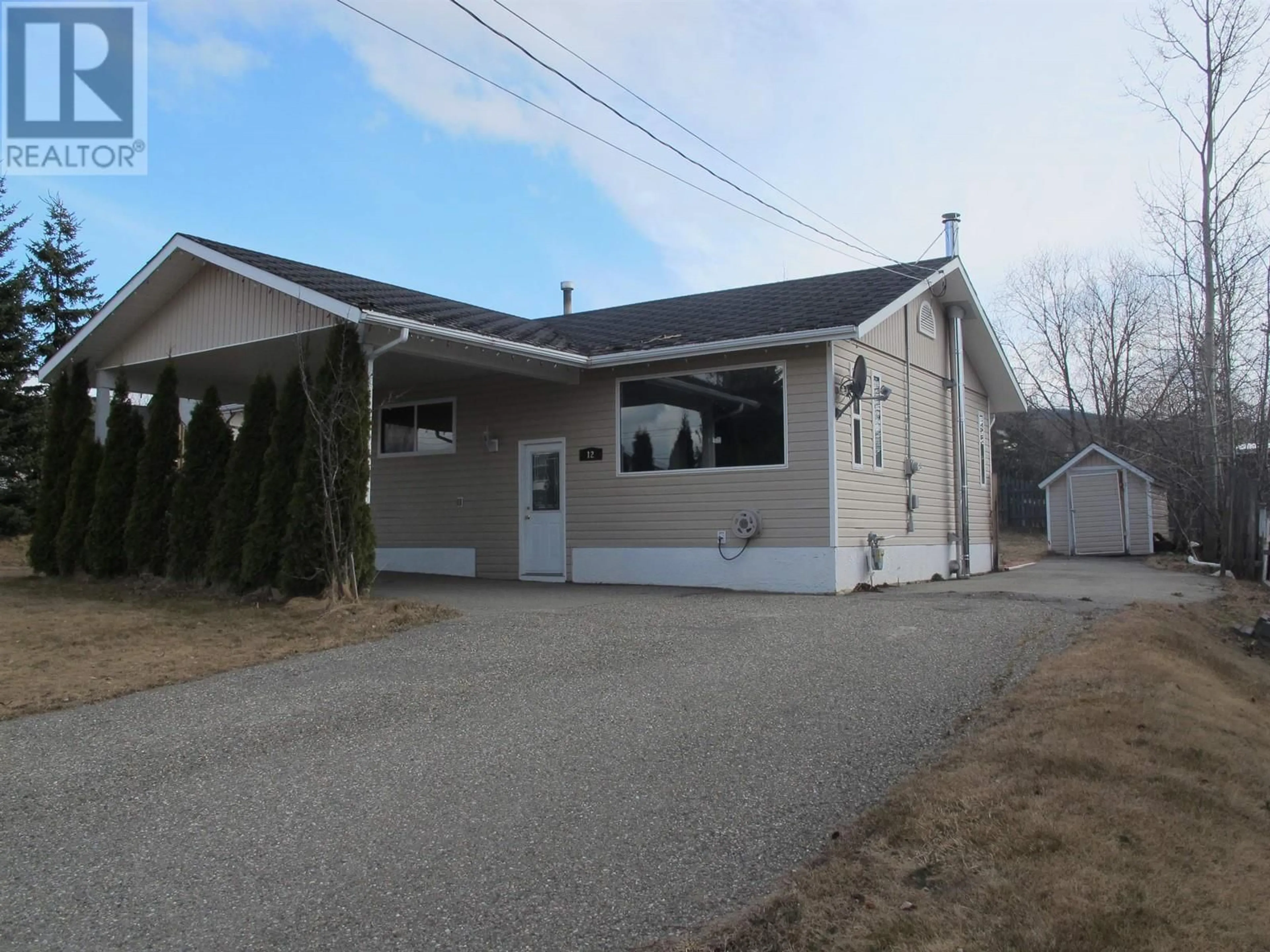 Home with vinyl exterior material, street for 12 RALSTON DRIVE, Mackenzie British Columbia V0J2C0