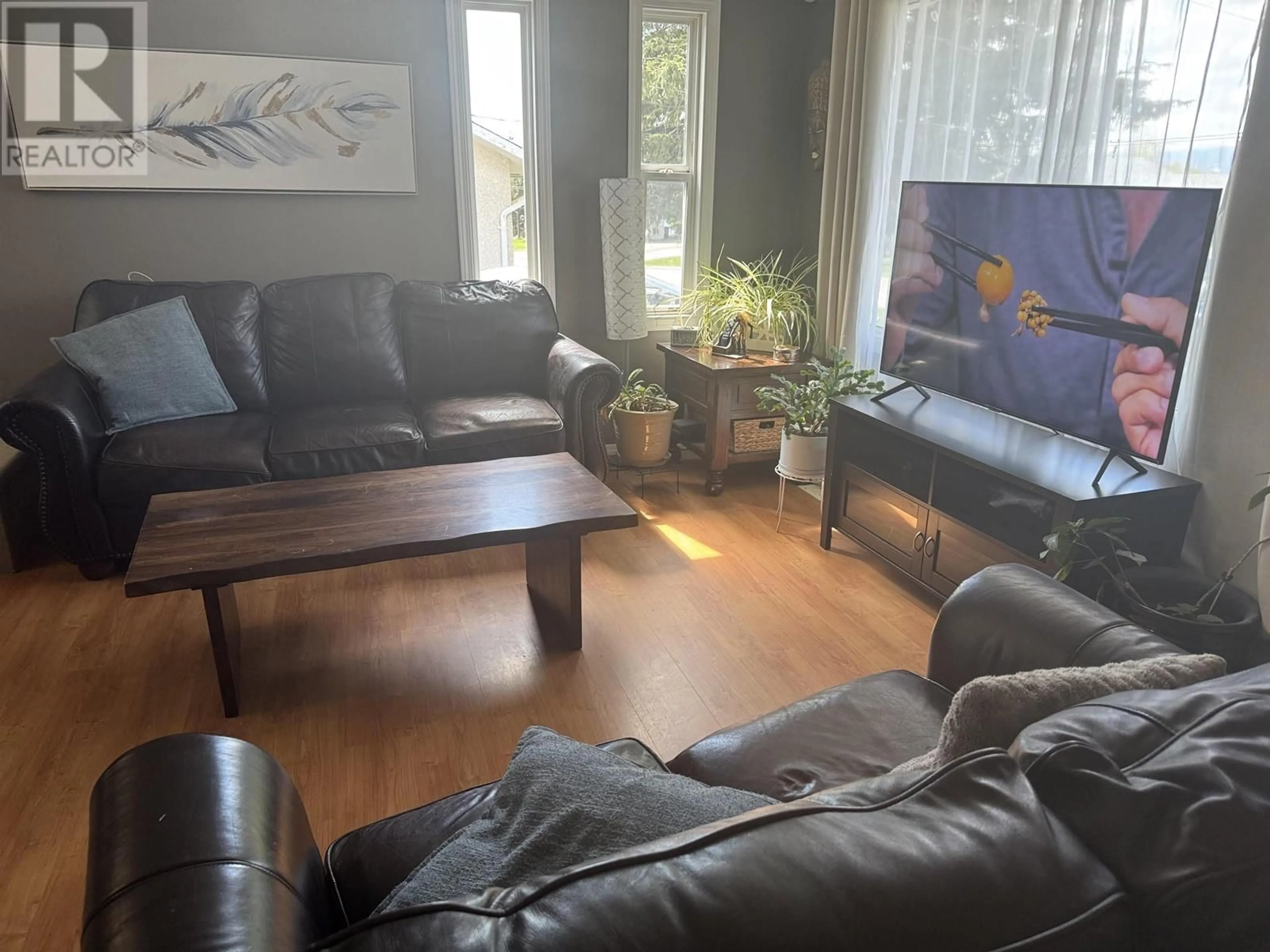 Living room with furniture, wood/laminate floor for 12 RALSTON DRIVE, Mackenzie British Columbia V0J2C0
