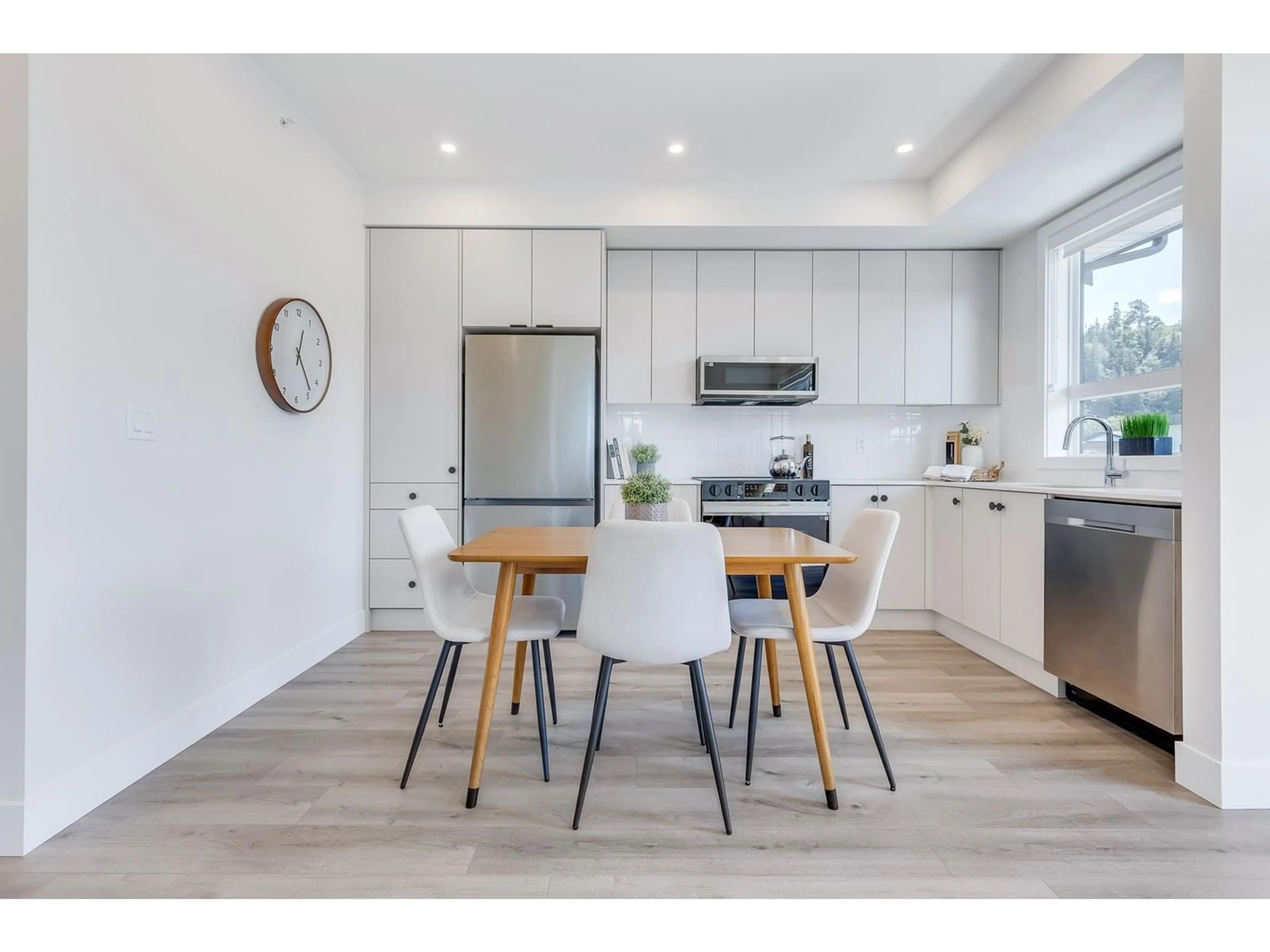 Open concept kitchen, wood/laminate floor for 603 - 45497 CAMPUS DRIVE, Chilliwack British Columbia V2R6L8