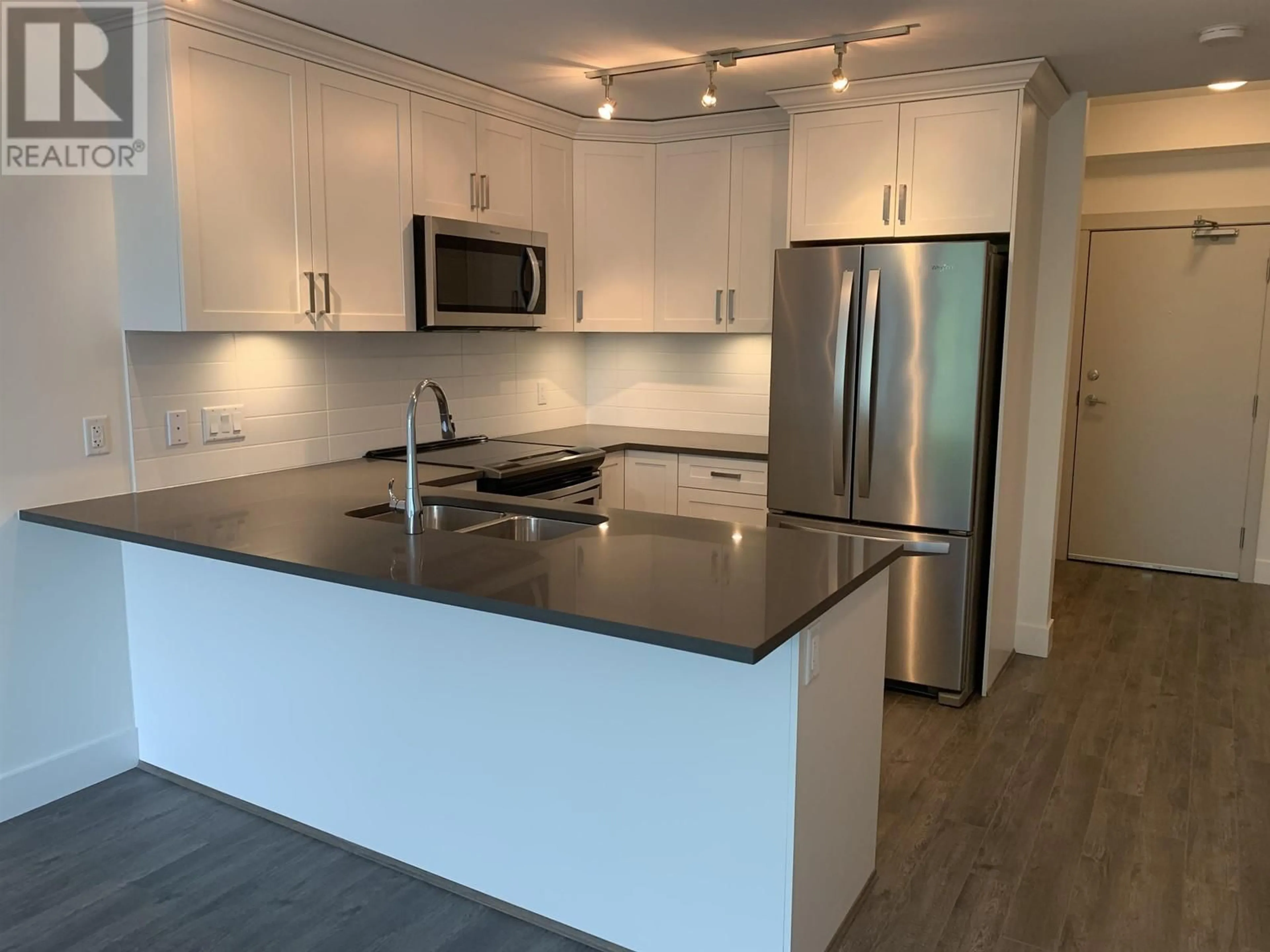 Open concept kitchen, wood/laminate floor for 306 - 2436 KELLY AVENUE, Port Coquitlam British Columbia V3C1Y4