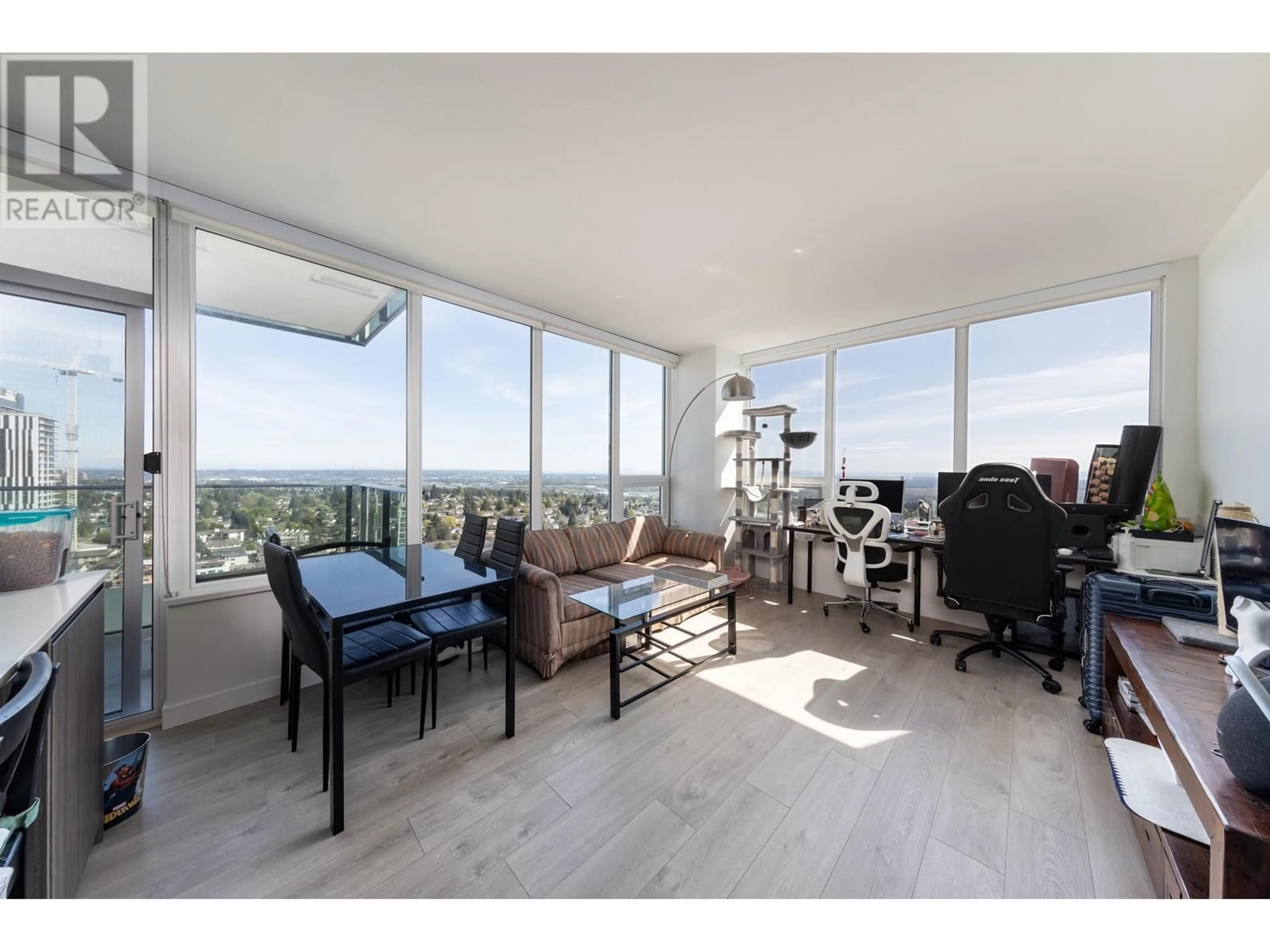 Living room with furniture, wood/laminate floor for 2404 - 6463 SILVER AVENUE, Burnaby British Columbia V5H0K4