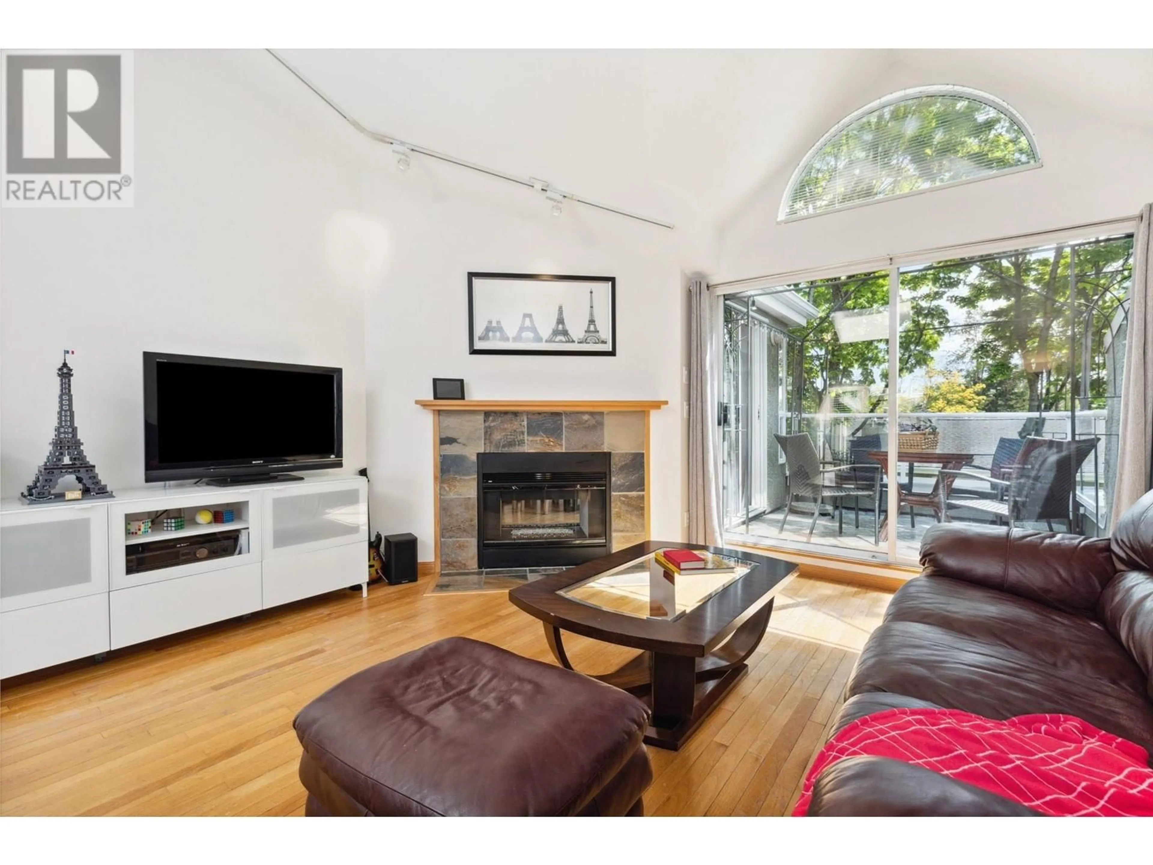 Living room with furniture, wood/laminate floor for 2318 QUAYSIDE COURT, Vancouver British Columbia V5P4W2