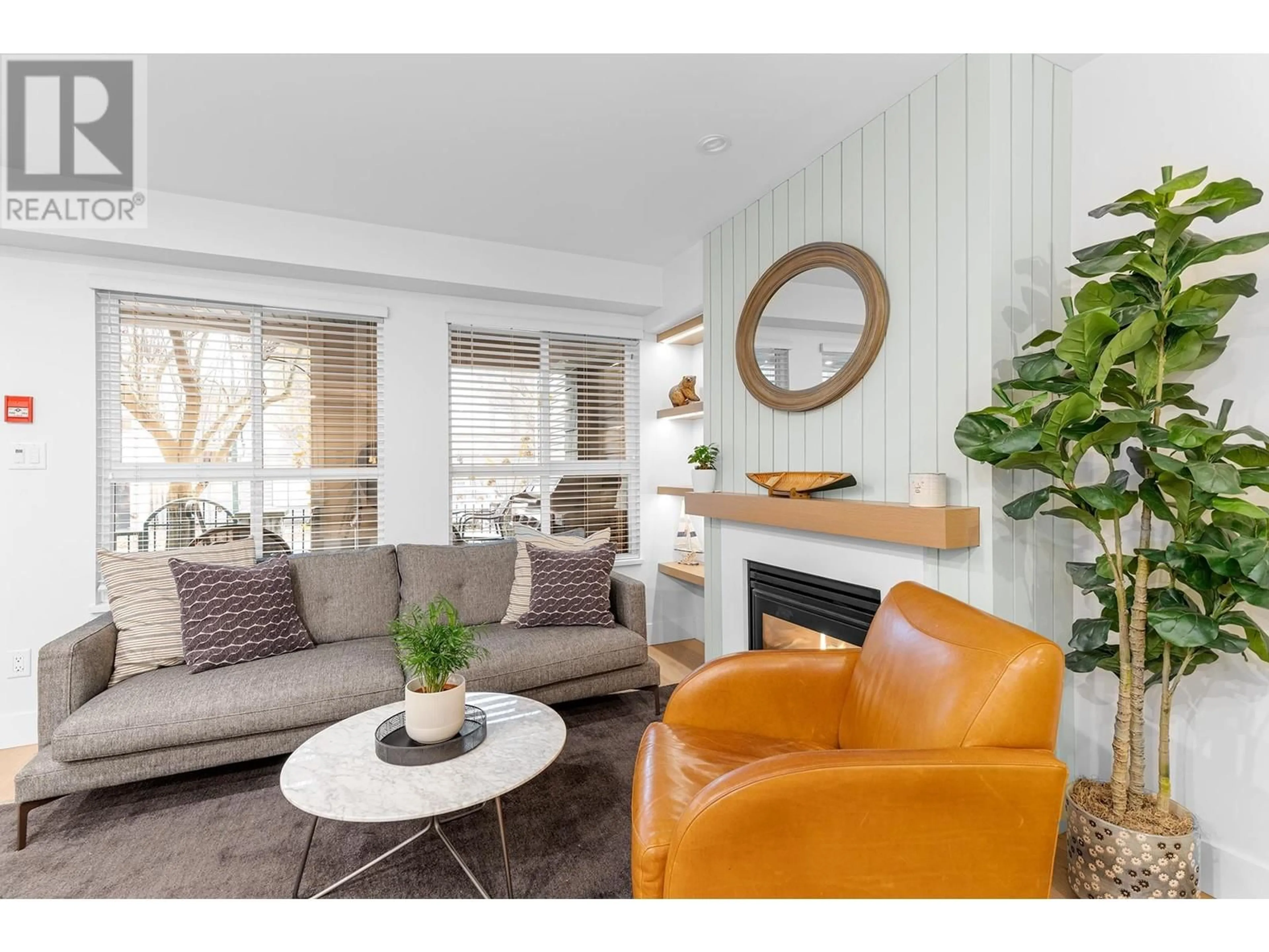Living room with furniture, wood/laminate floor for 3218 HEATHER STREET, Vancouver British Columbia V5Z4R9