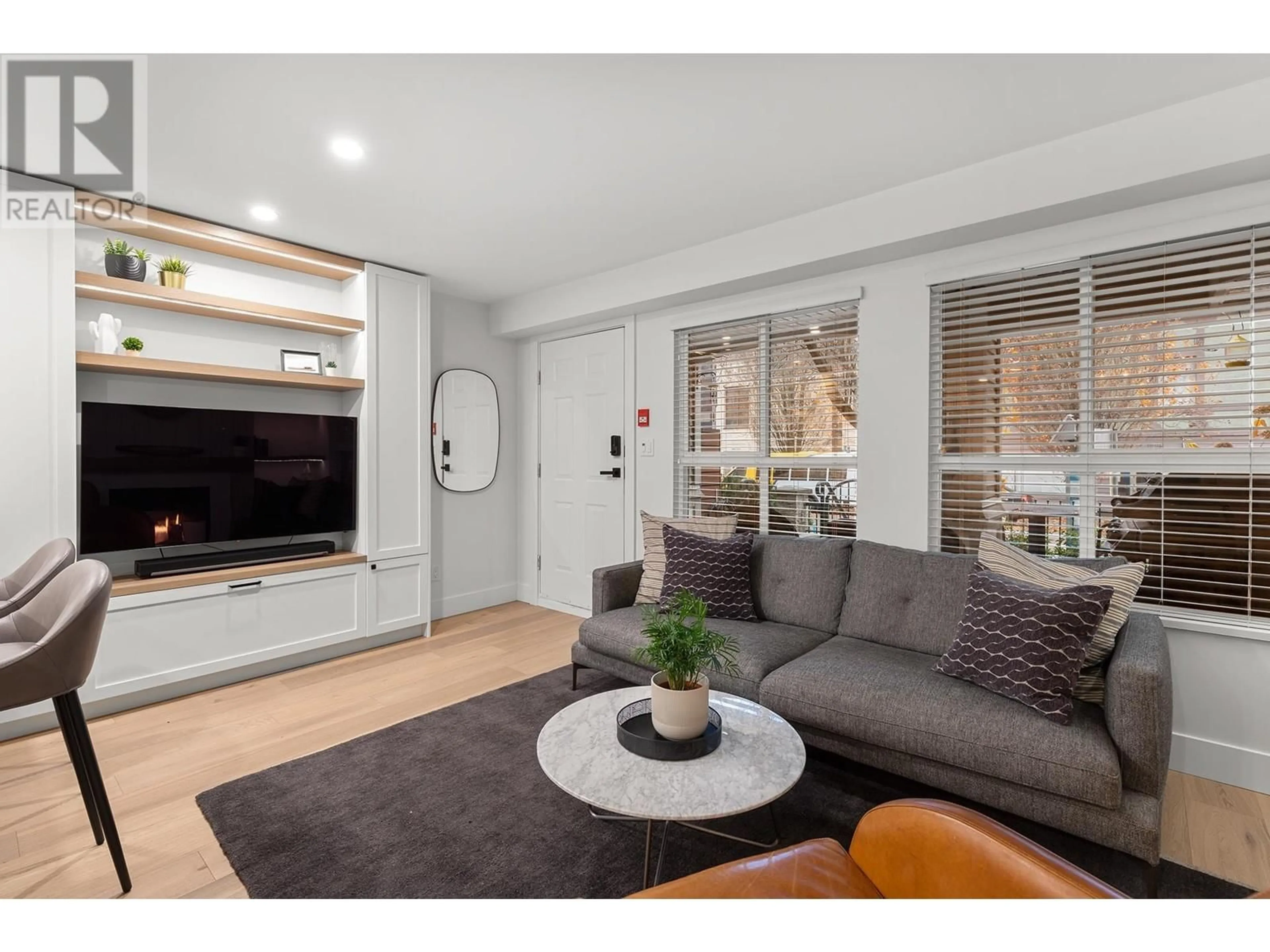 Living room with furniture, wood/laminate floor for 3218 HEATHER STREET, Vancouver British Columbia V5Z4R9
