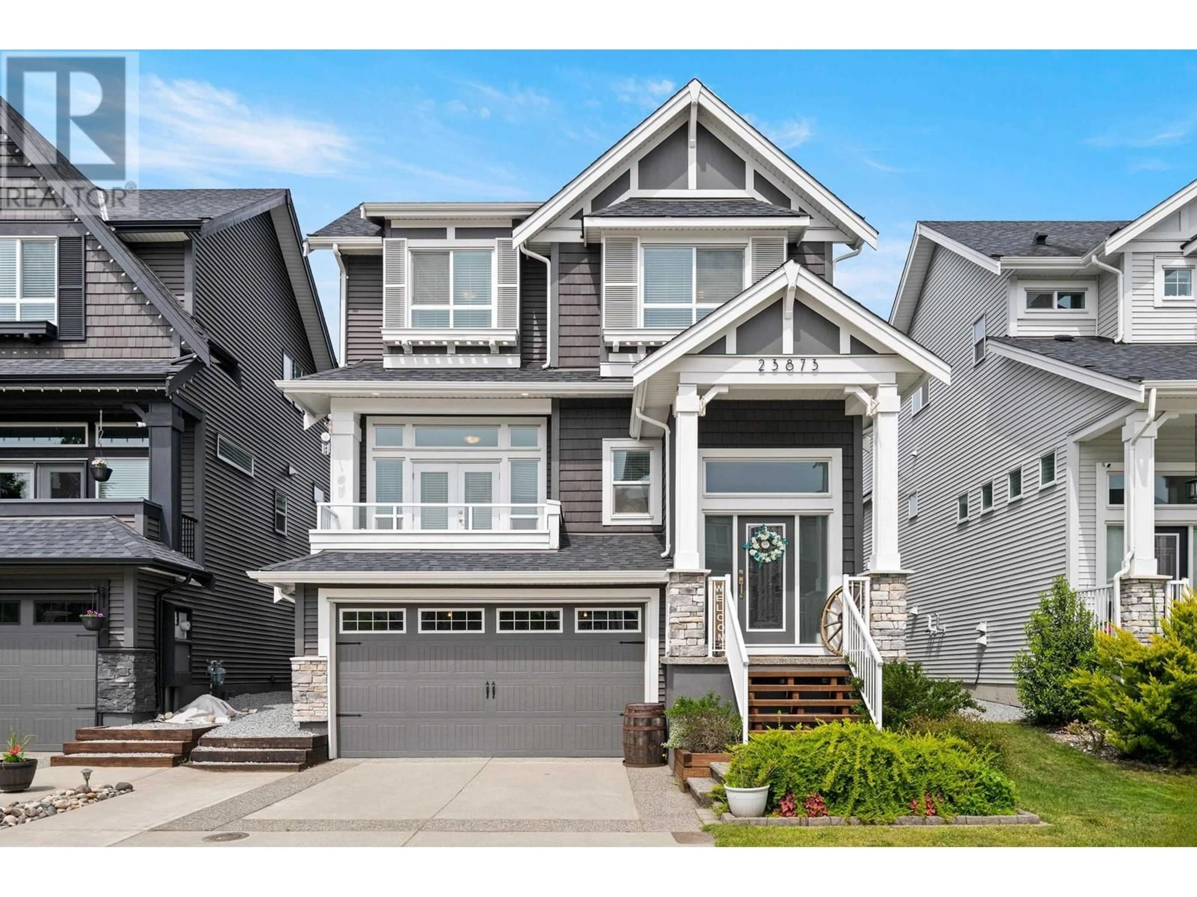 Home with vinyl exterior material, street for 23873 103A AVENUE, Maple Ridge British Columbia V2W1G3