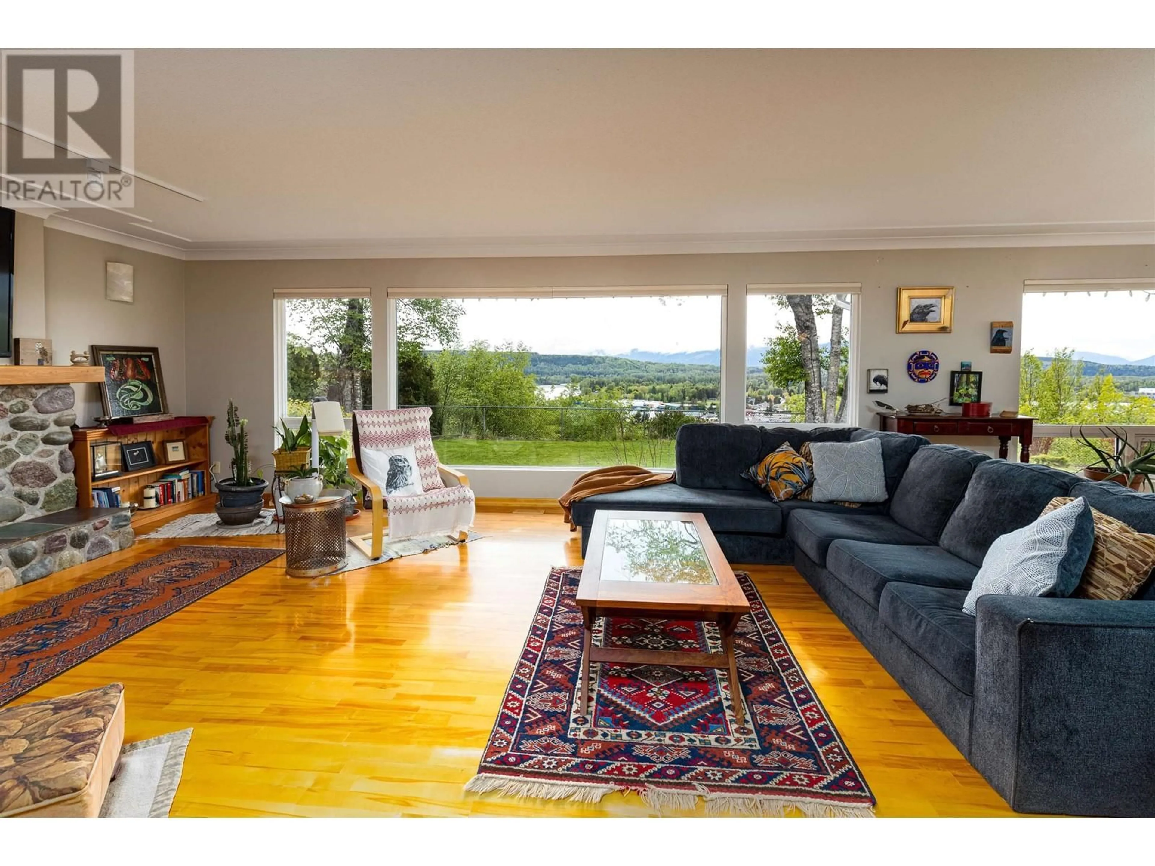Living room with furniture, wood/laminate floor for 4407 BIRCH AVENUE, Terrace British Columbia V8G1X3