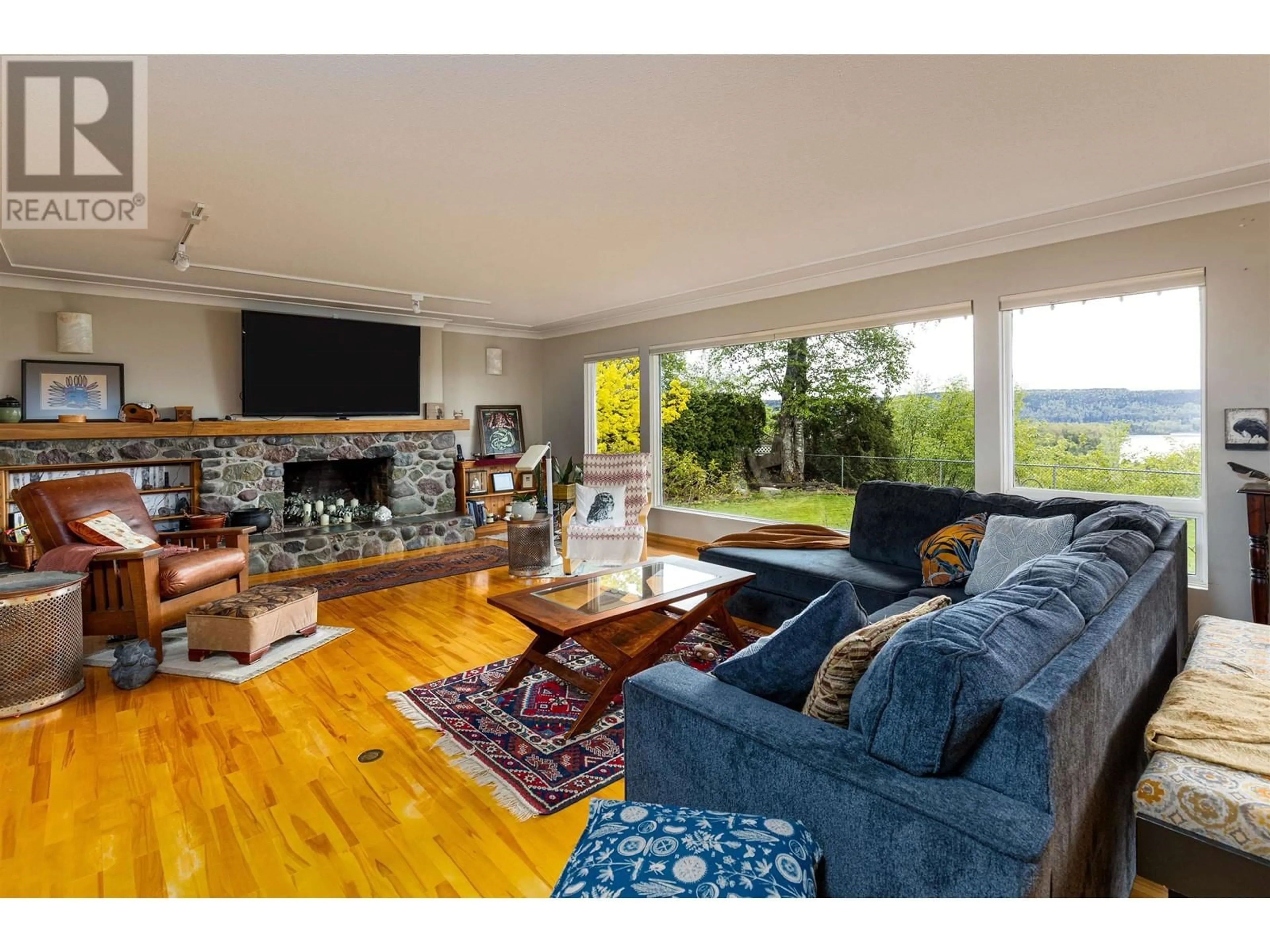 Living room with furniture, wood/laminate floor for 4407 BIRCH AVENUE, Terrace British Columbia V8G1X3