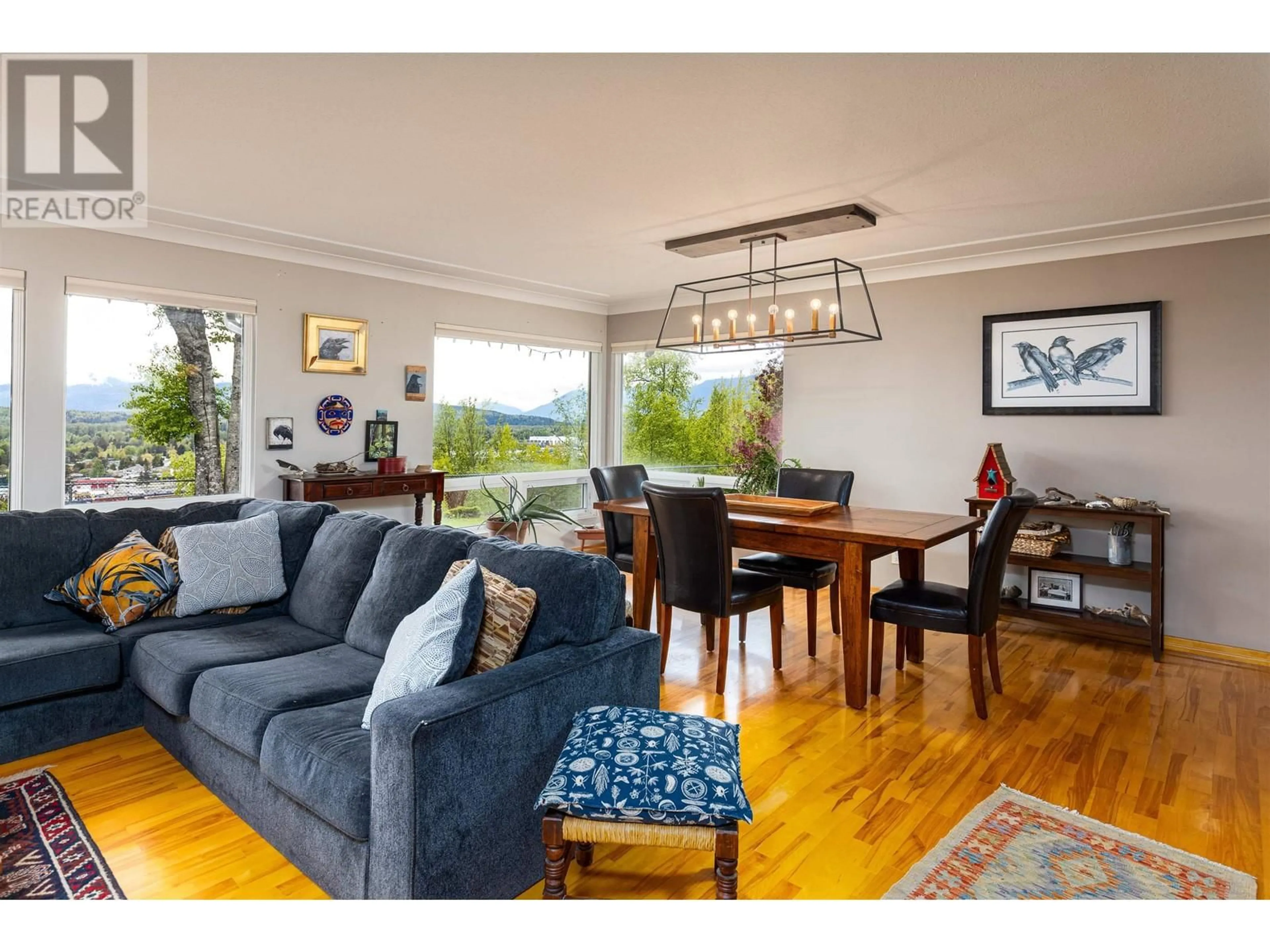 Living room with furniture, wood/laminate floor for 4407 BIRCH AVENUE, Terrace British Columbia V8G1X3