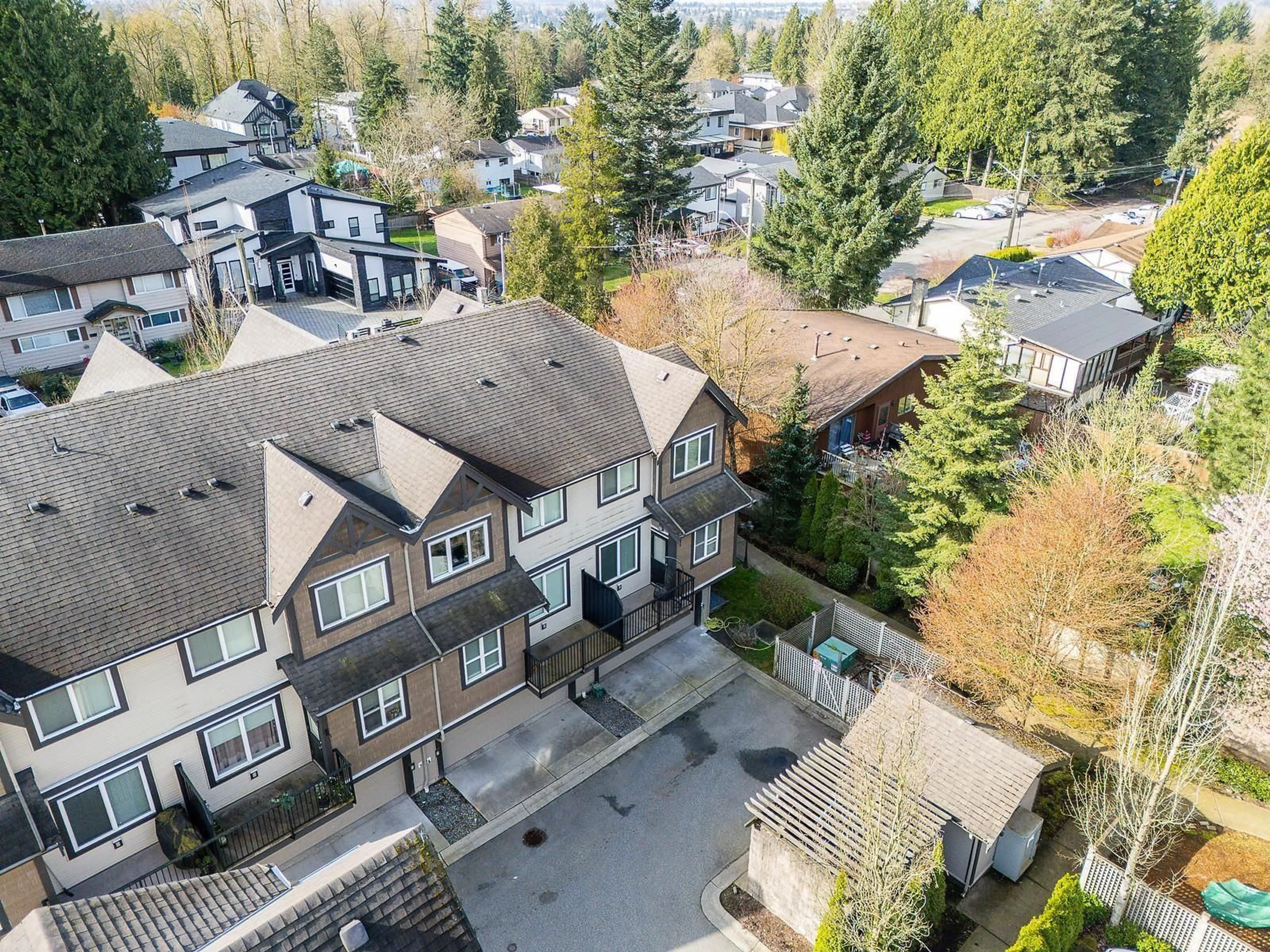 A pic from outside/outdoor area/front of a property/back of a property/a pic from drone, unknown for 1 - 9077 150, Surrey British Columbia V3R7Z2