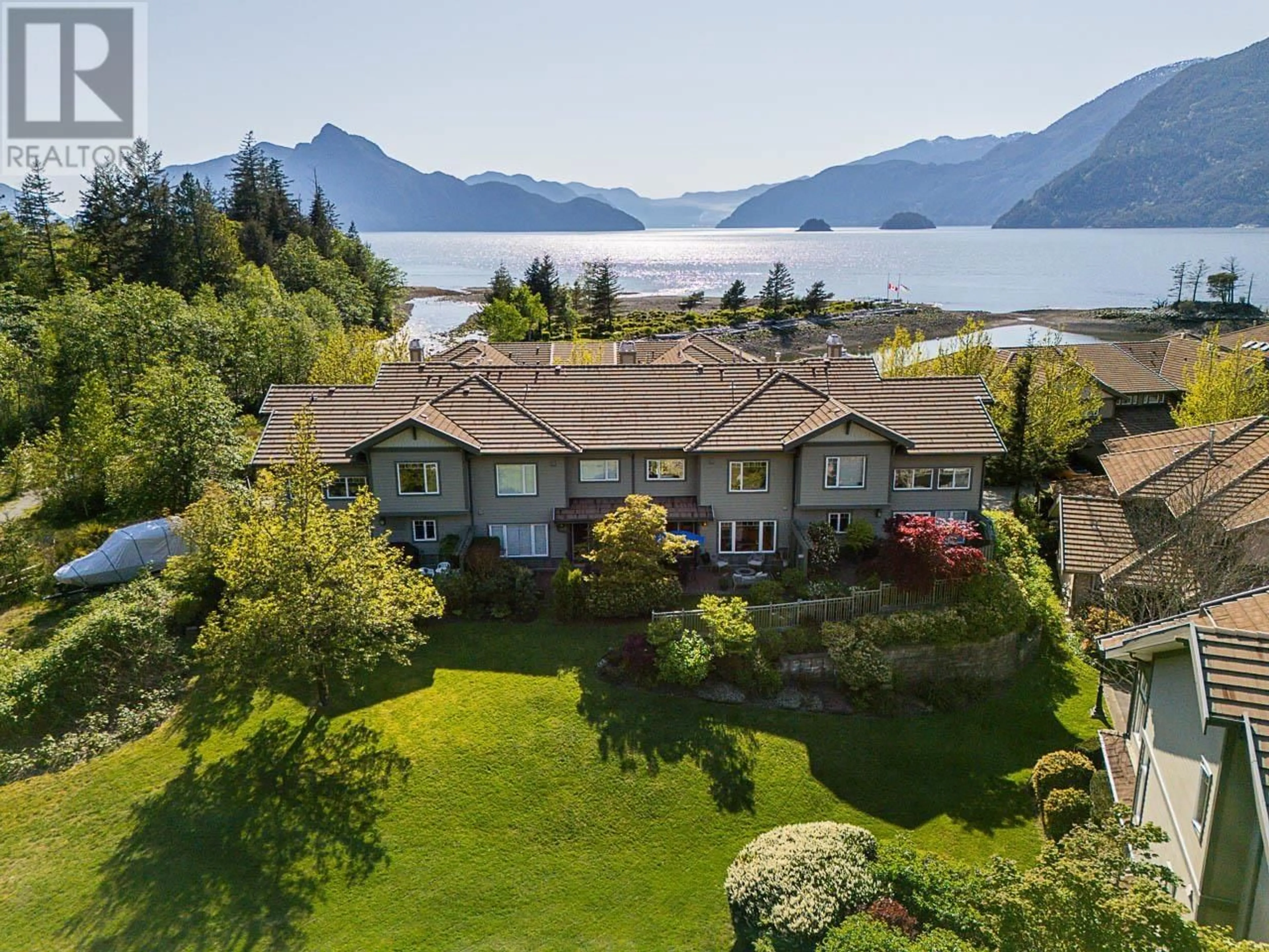 A pic from outside/outdoor area/front of a property/back of a property/a pic from drone, water/lake/river/ocean view for 54 BEACH DRIVE, Furry Creek British Columbia V8B1A2