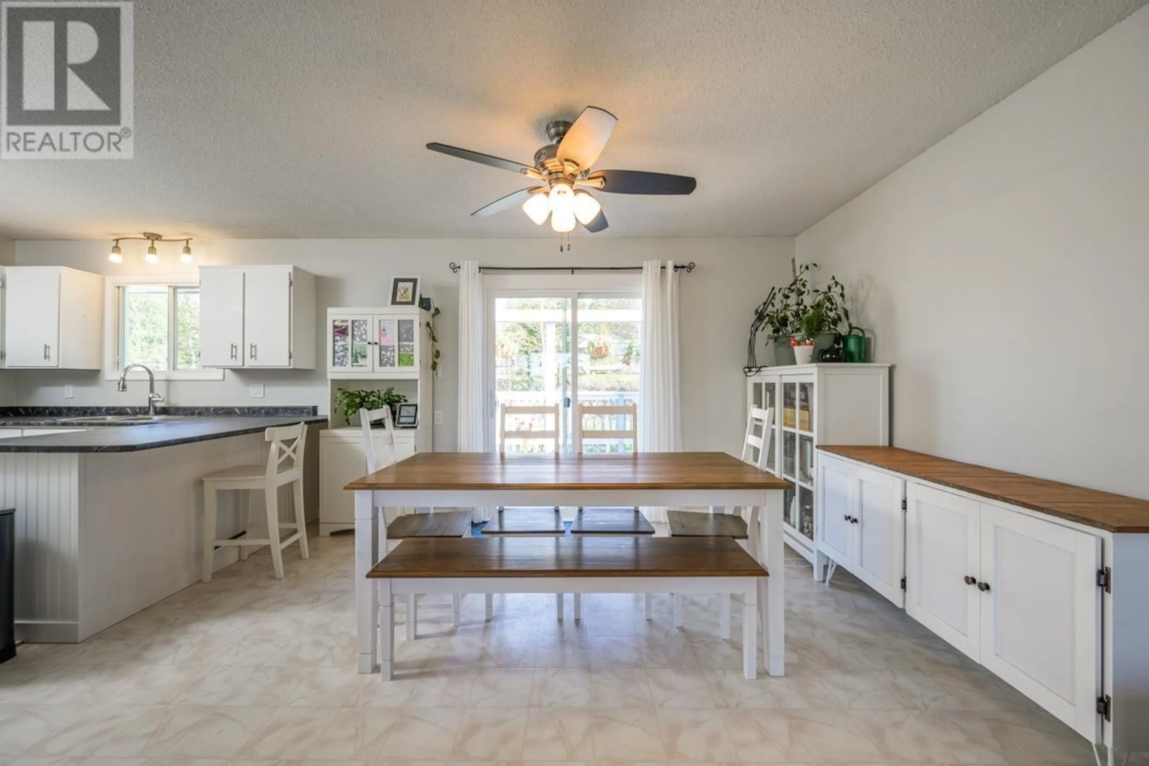 Open concept kitchen, ceramic/tile floor for 7410 THOMPSON DRIVE, Prince George British Columbia V2N5N5