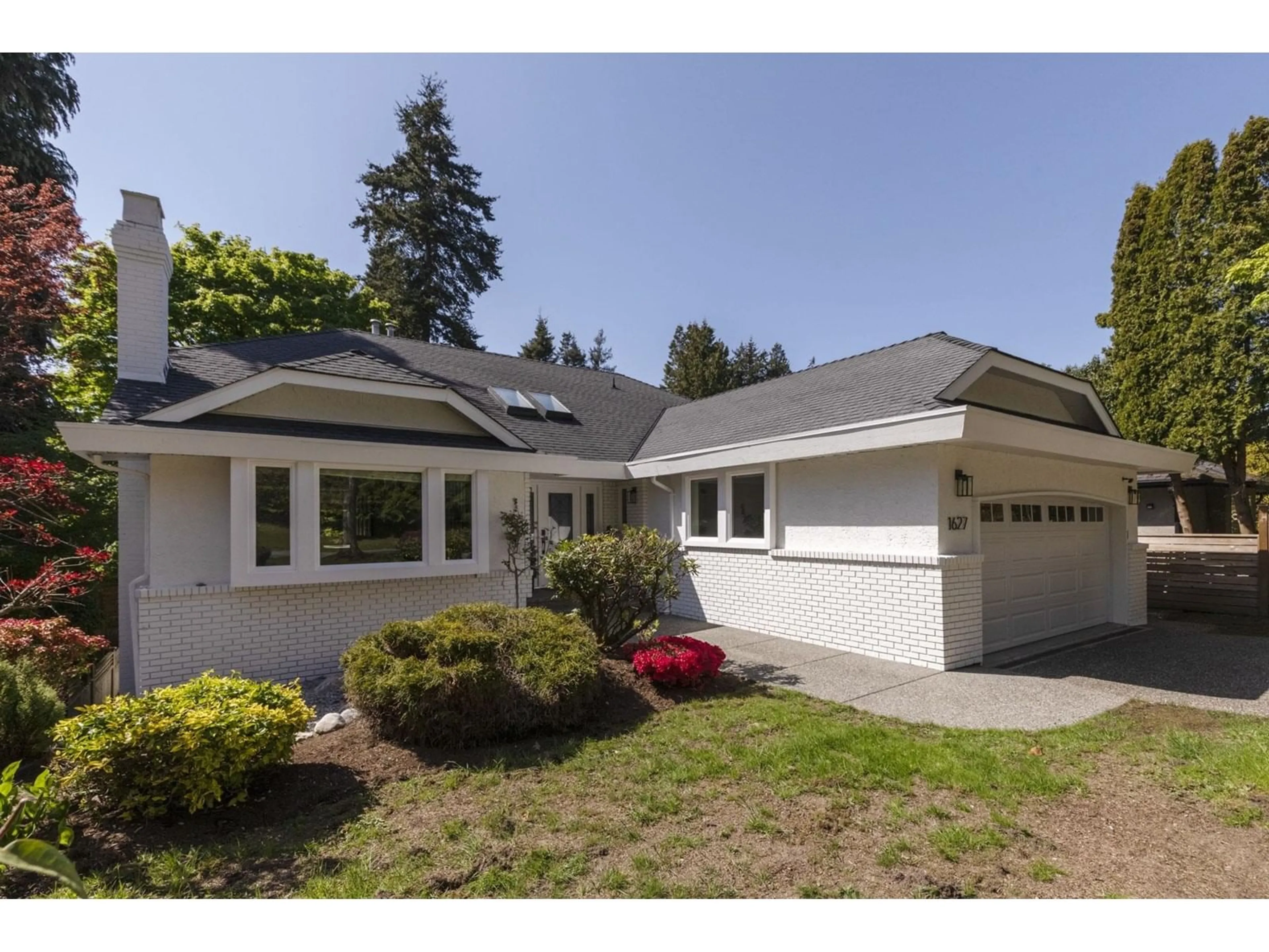 Home with vinyl exterior material, street for 1627 127, Surrey British Columbia V4A9G2