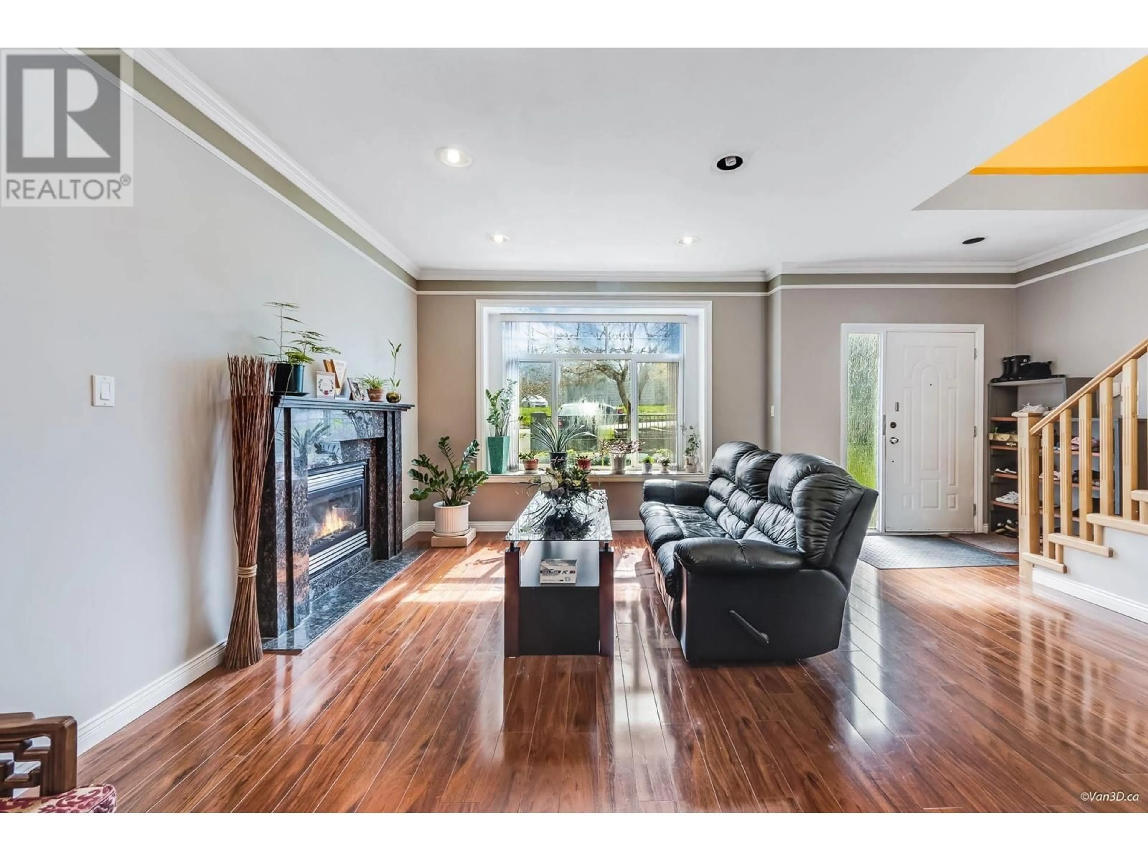 Living room with furniture, wood/laminate floor for 3807 REGENT STREET, Burnaby British Columbia V5C4G7
