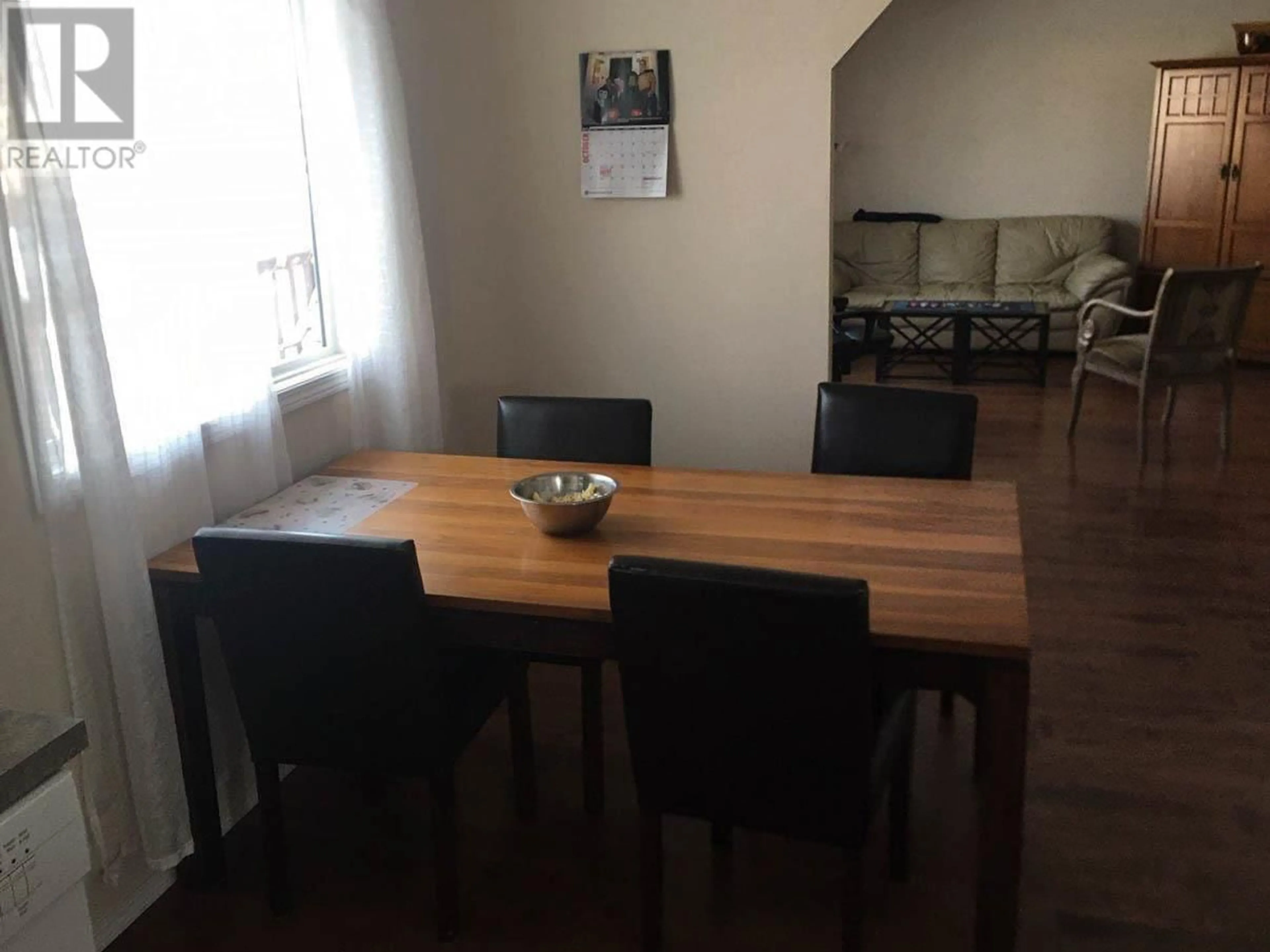 Dining room, wood/laminate floor for 8723 88 STREET, Fort St. John British Columbia V1J5A3