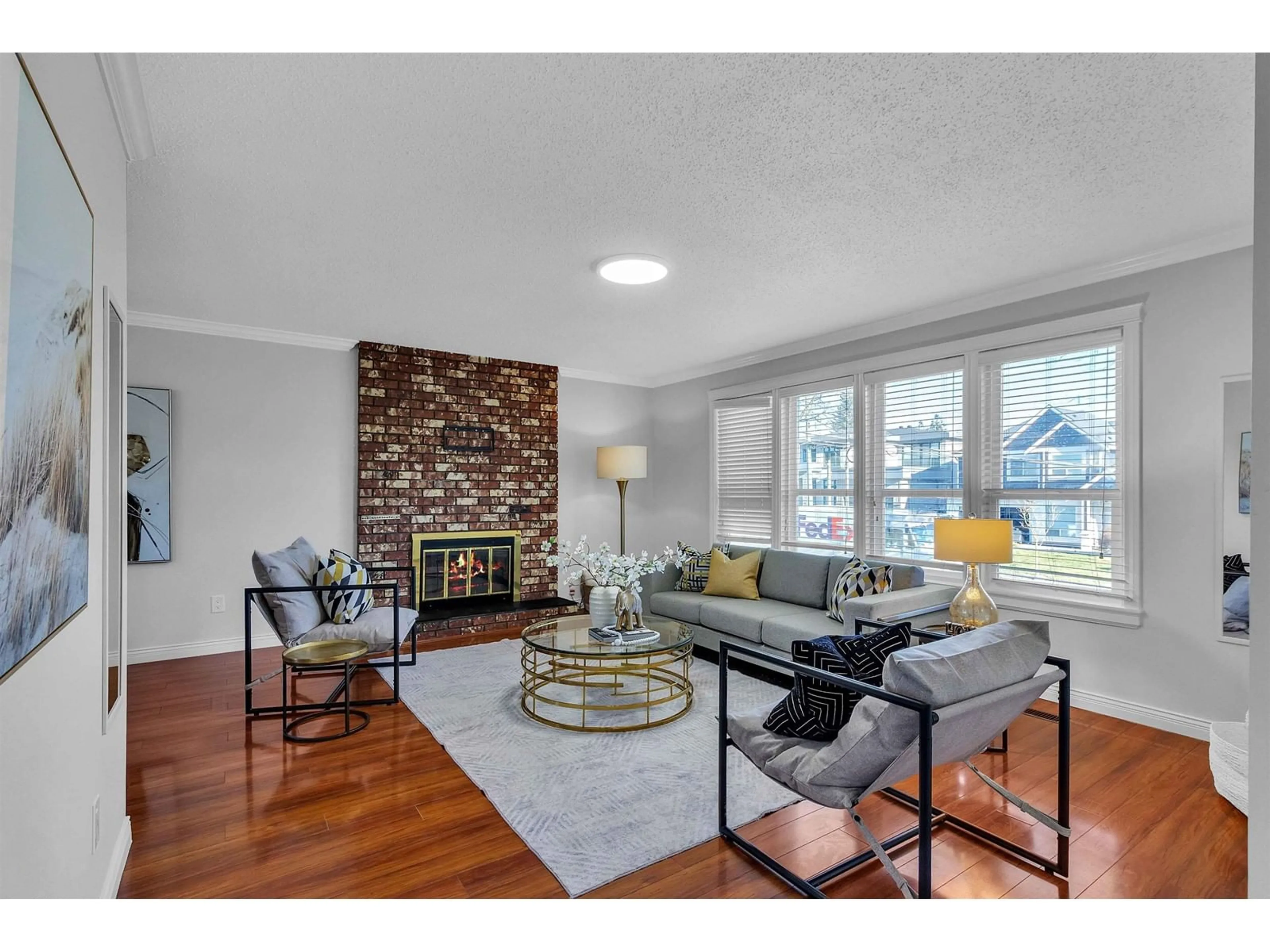 Living room with furniture, wood/laminate floor for 6281 130, Surrey British Columbia V3X1R7