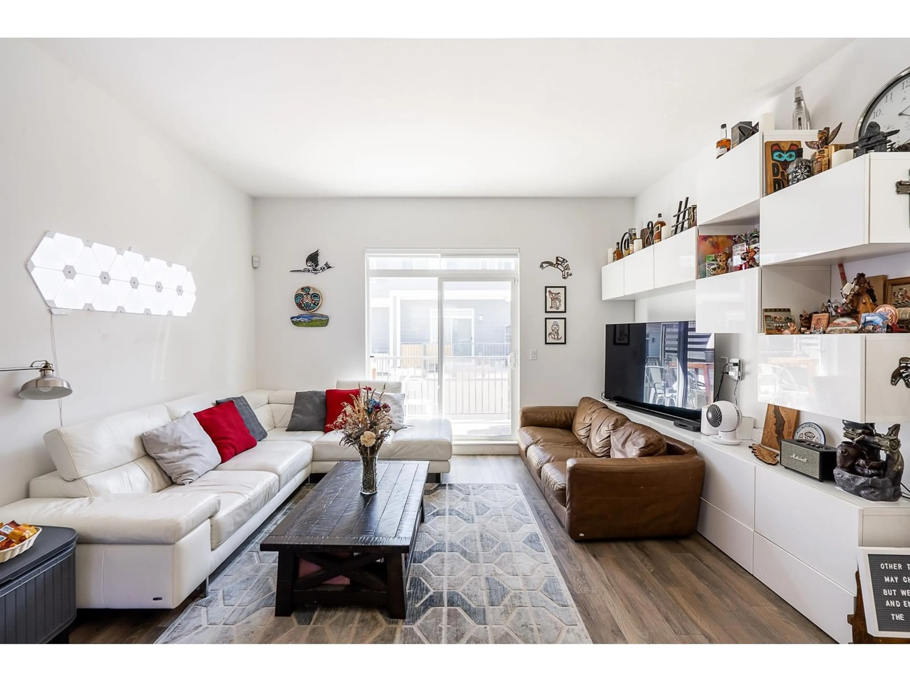 Living room with furniture, wood/laminate floor for 94 - 8130 136A, Surrey British Columbia V3W1H9