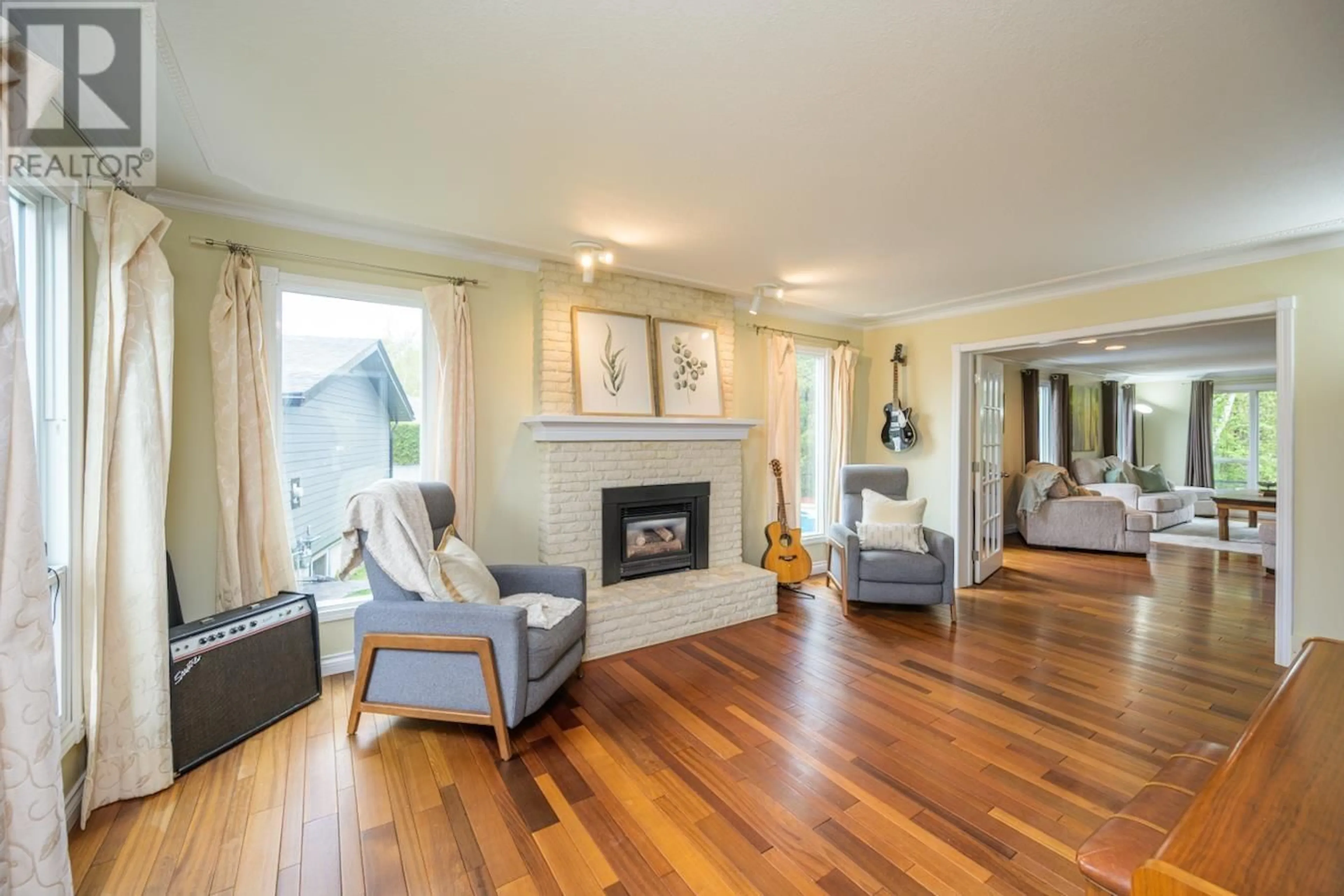Living room with furniture, wood/laminate floor for 5542 MURRAY PLACE, Prince George British Columbia V2N3P4