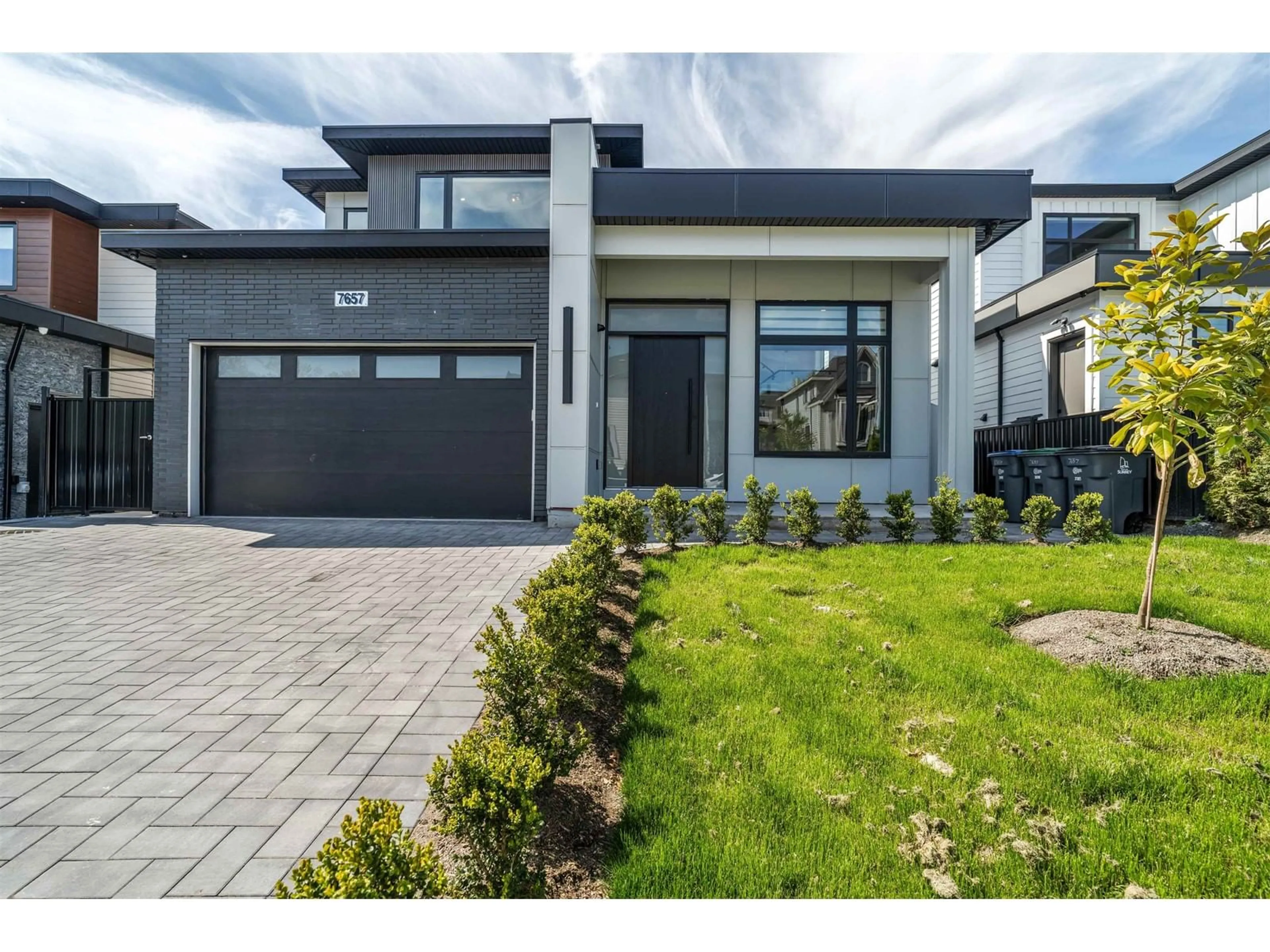 Home with brick exterior material, street for 7657 155, Surrey British Columbia V3S3P3