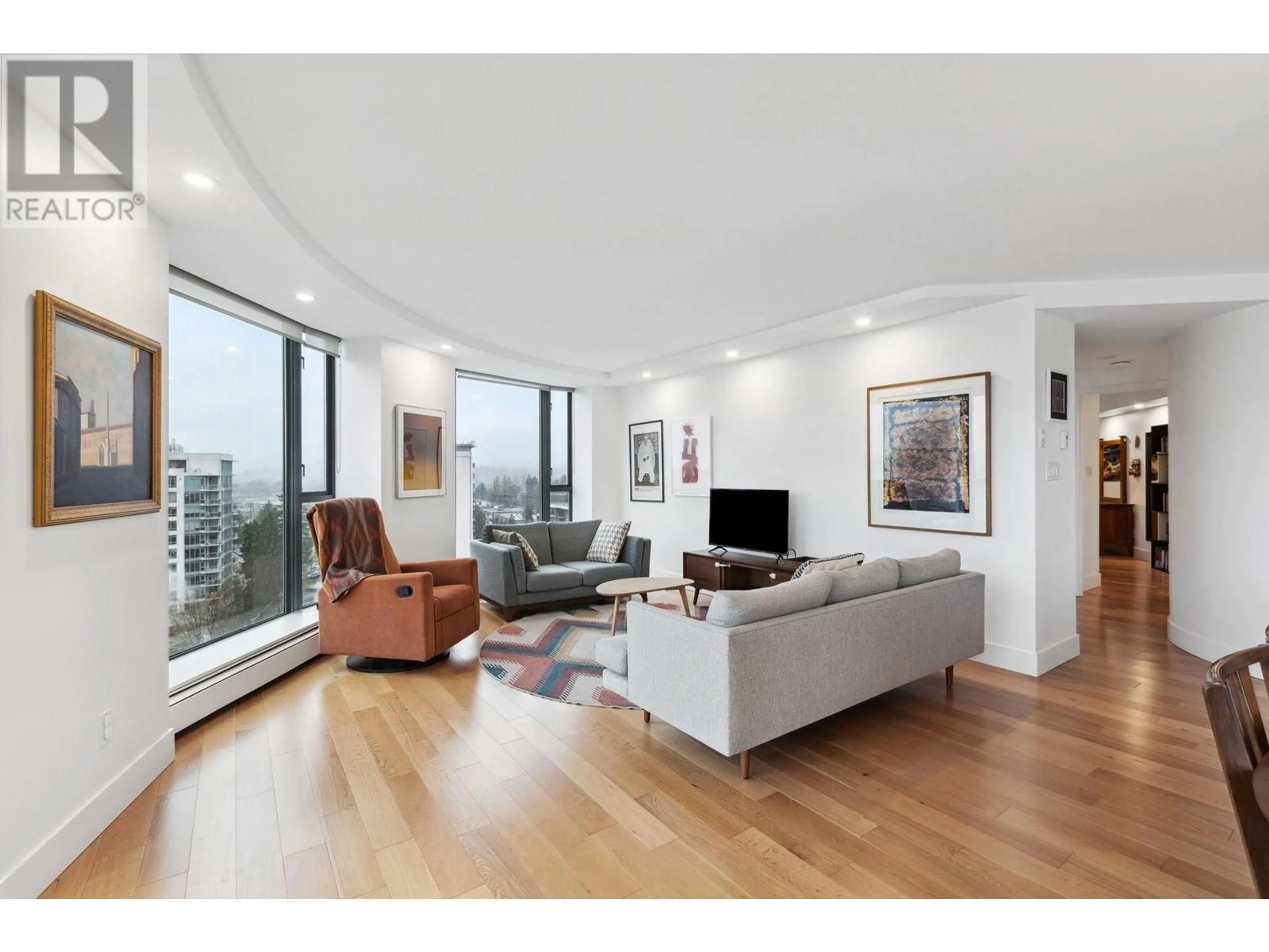 Living room with furniture, wood/laminate floor for 1202 - 120 2ND STREET, North Vancouver British Columbia V7M1C3