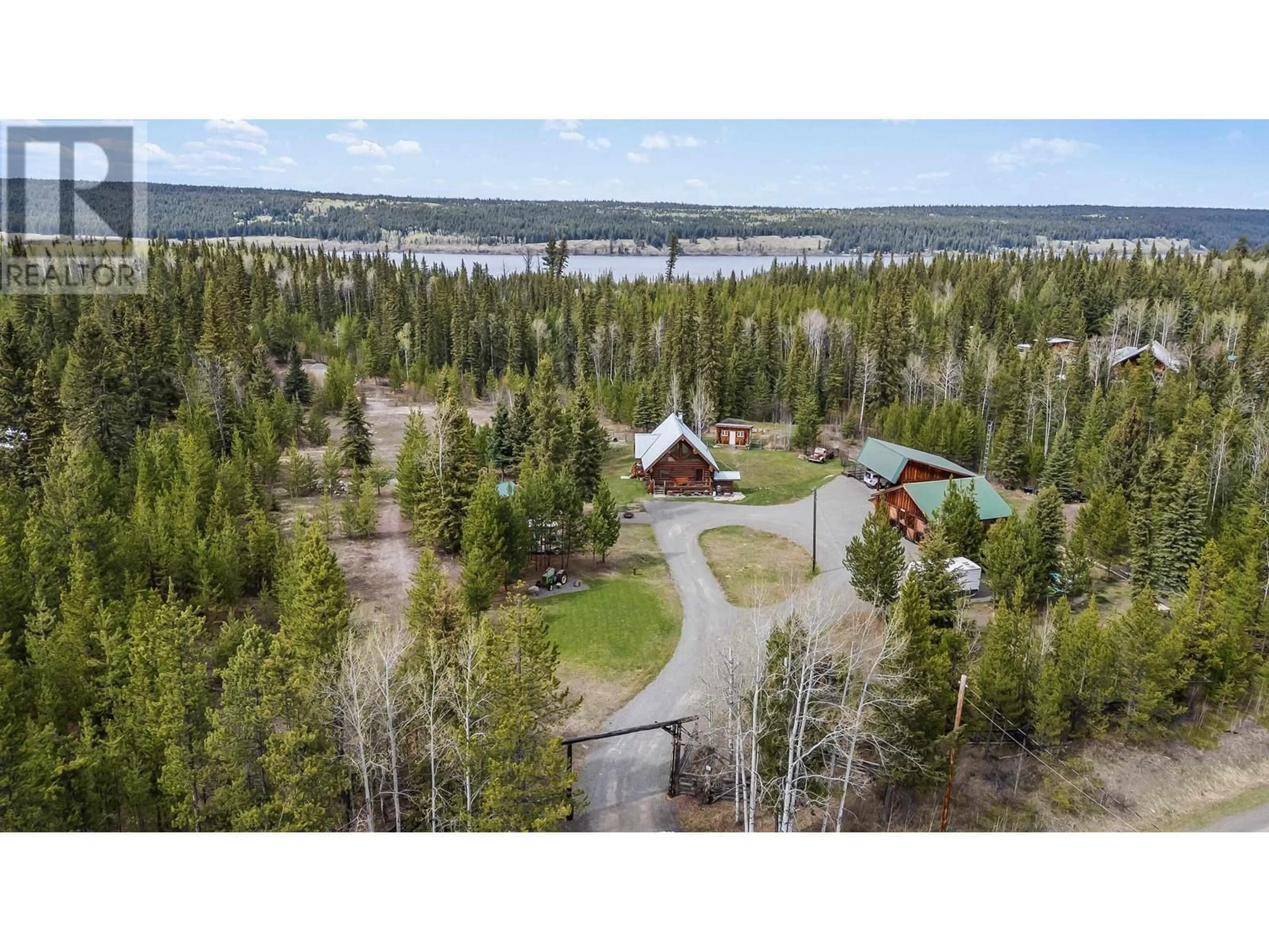 A pic from outside/outdoor area/front of a property/back of a property/a pic from drone, water/lake/river/ocean view for 6483 HORSE LAKE ROAD, Horse Lake British Columbia V0K1X3