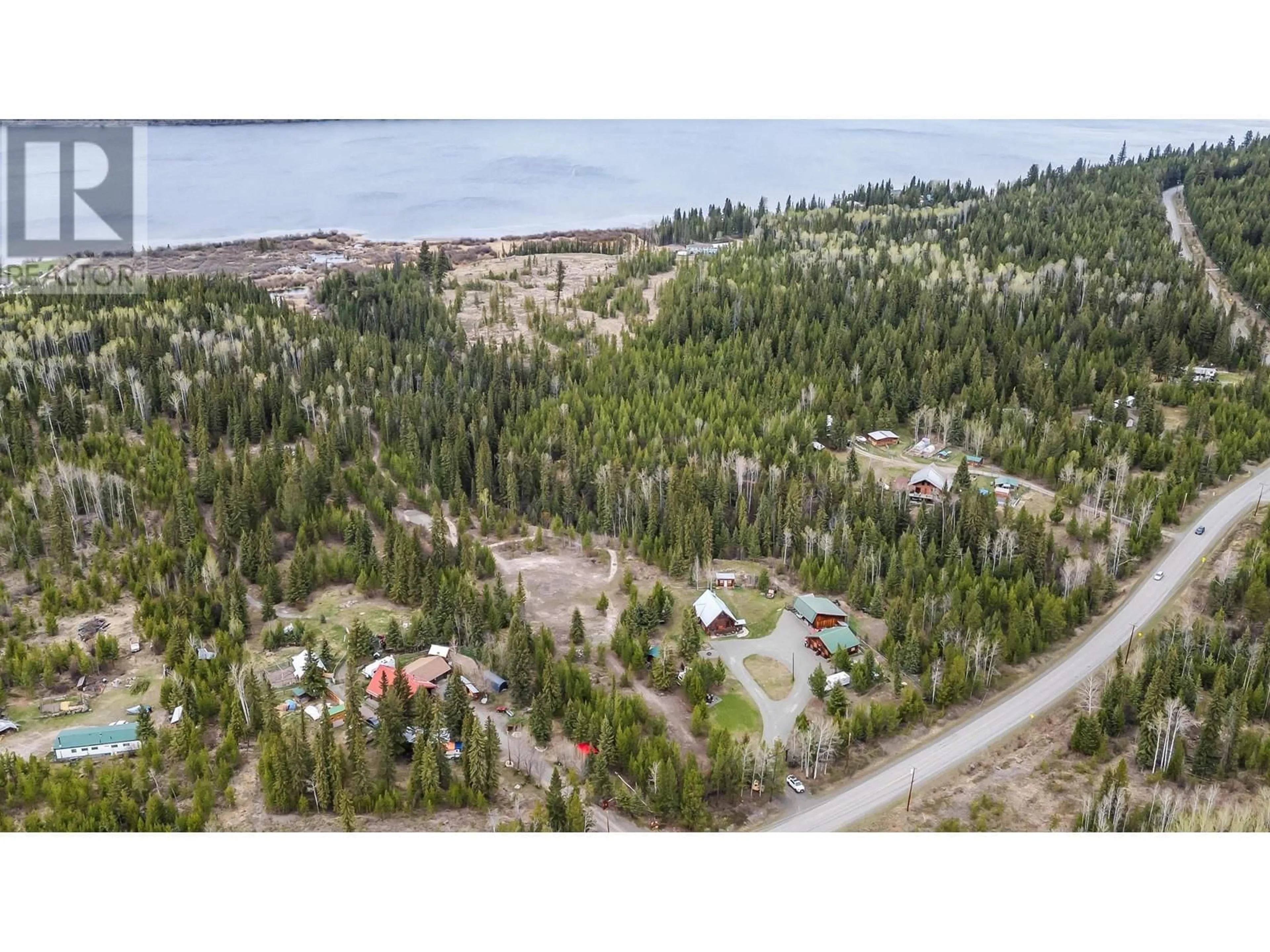 A pic from outside/outdoor area/front of a property/back of a property/a pic from drone, forest/trees view for 6483 HORSE LAKE ROAD, Horse Lake British Columbia V0K1X3