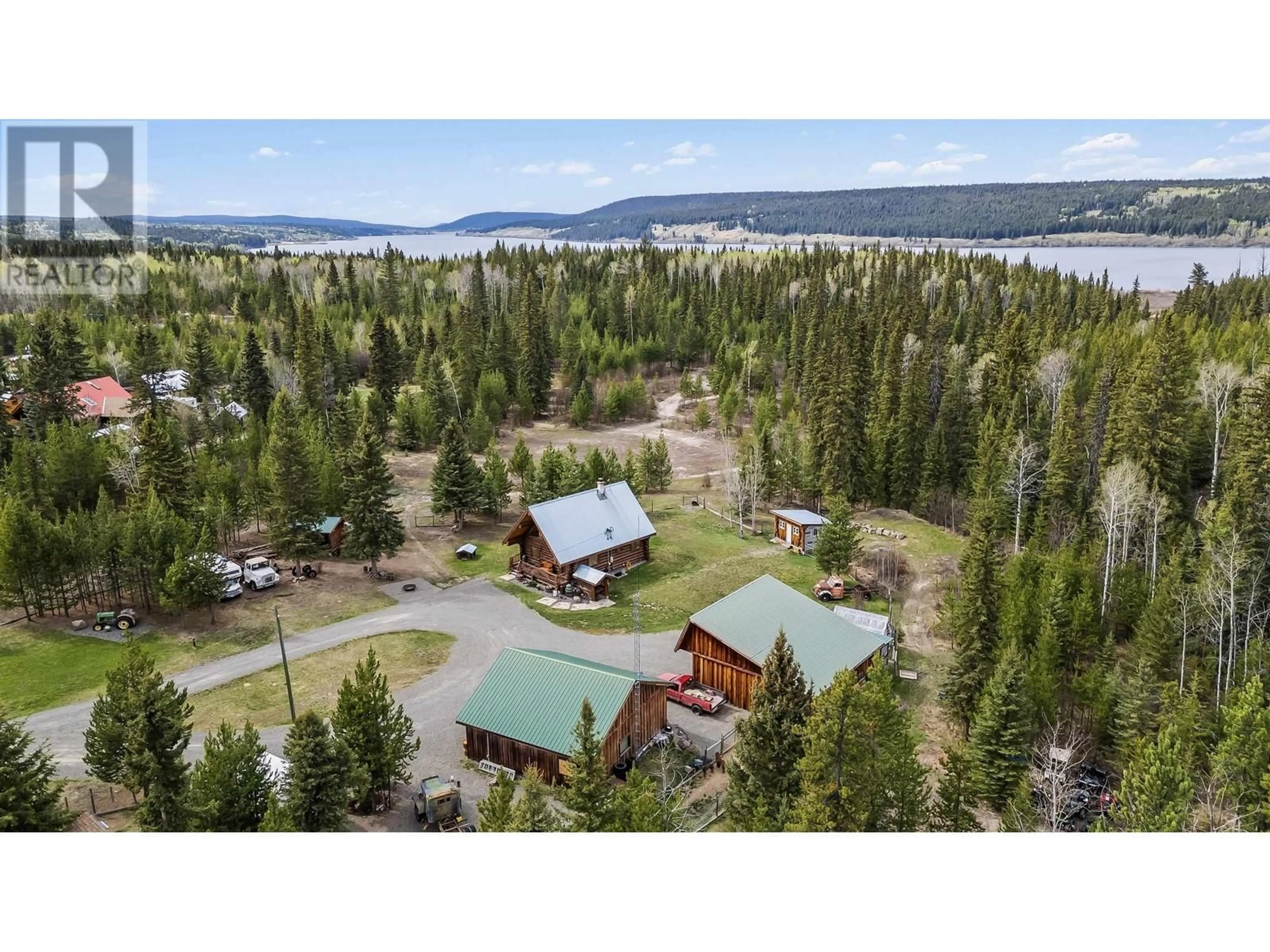 A pic from outside/outdoor area/front of a property/back of a property/a pic from drone, water/lake/river/ocean view for 6483 HORSE LAKE ROAD, Horse Lake British Columbia V0K1X3