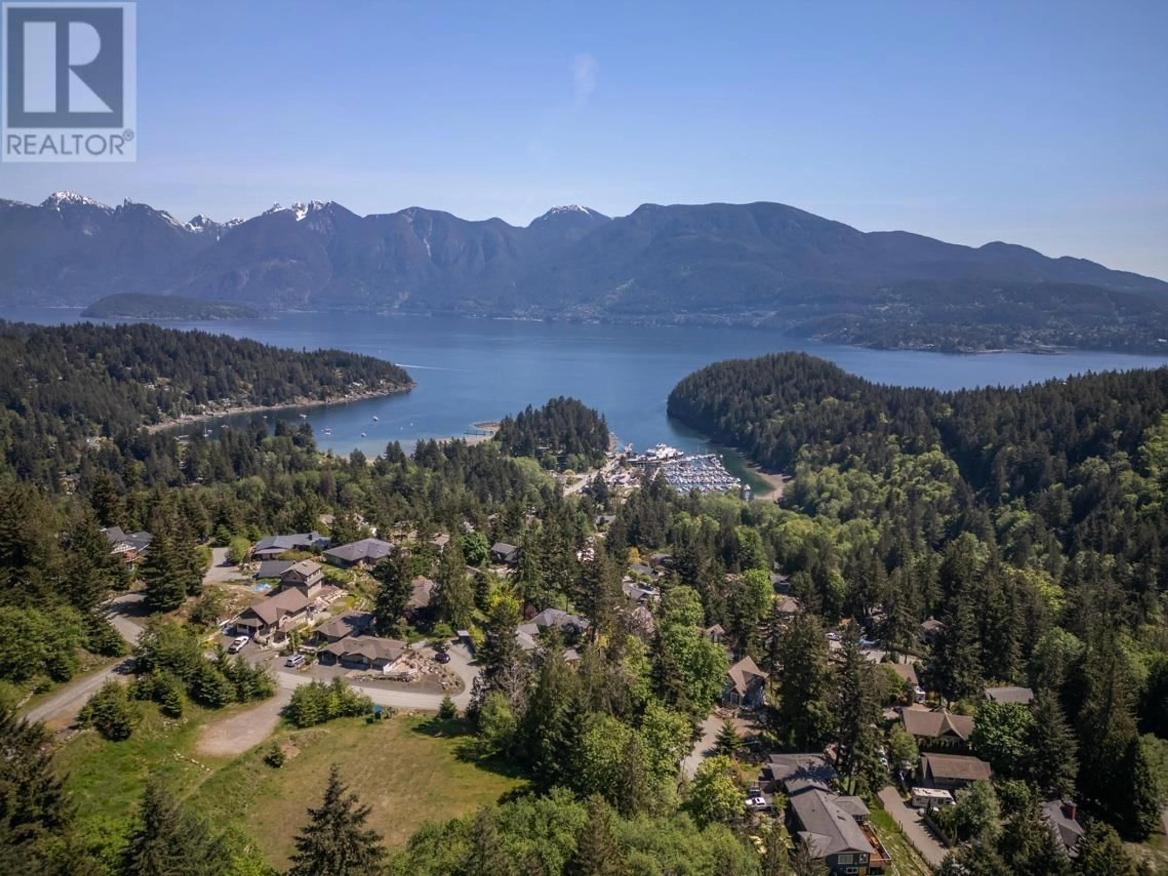 A pic from outside/outdoor area/front of a property/back of a property/a pic from drone, water/lake/river/ocean view for 576 CATES HILL ROAD, Bowen Island British Columbia V0N1G2