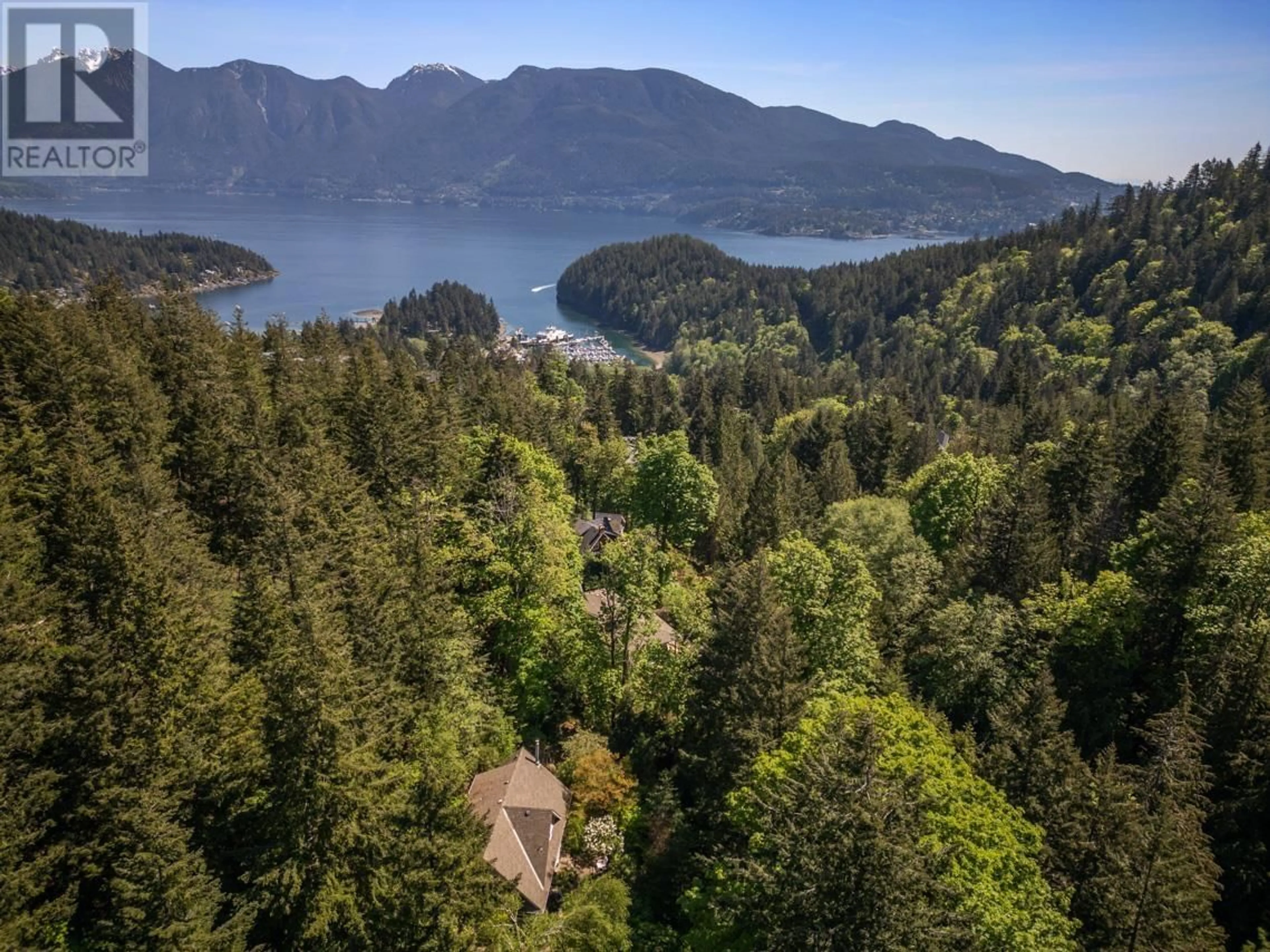 A pic from outside/outdoor area/front of a property/back of a property/a pic from drone, forest/trees view for 576 CATES HILL ROAD, Bowen Island British Columbia V0N1G2