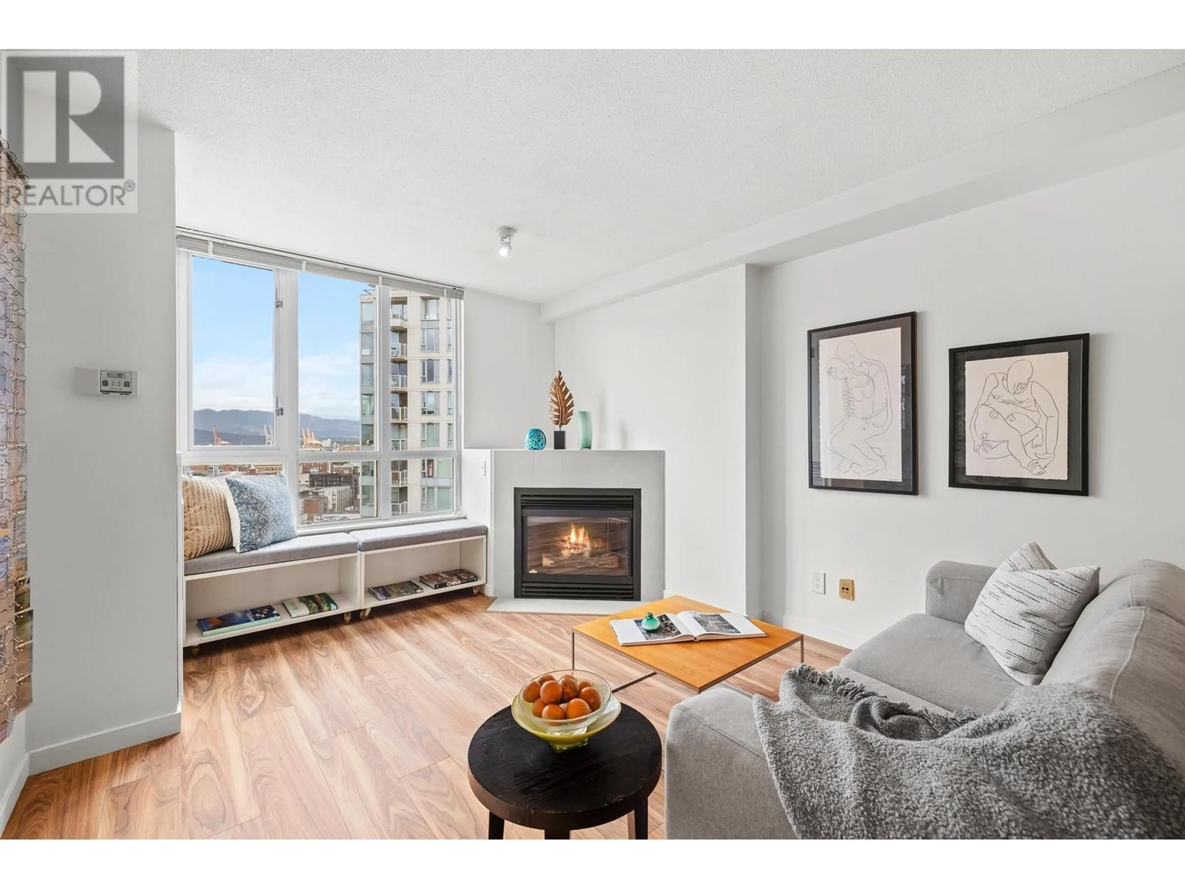 Living room with furniture, wood/laminate floor for 2307 - 63 KEEFER PLACE, Vancouver British Columbia V6B6N6