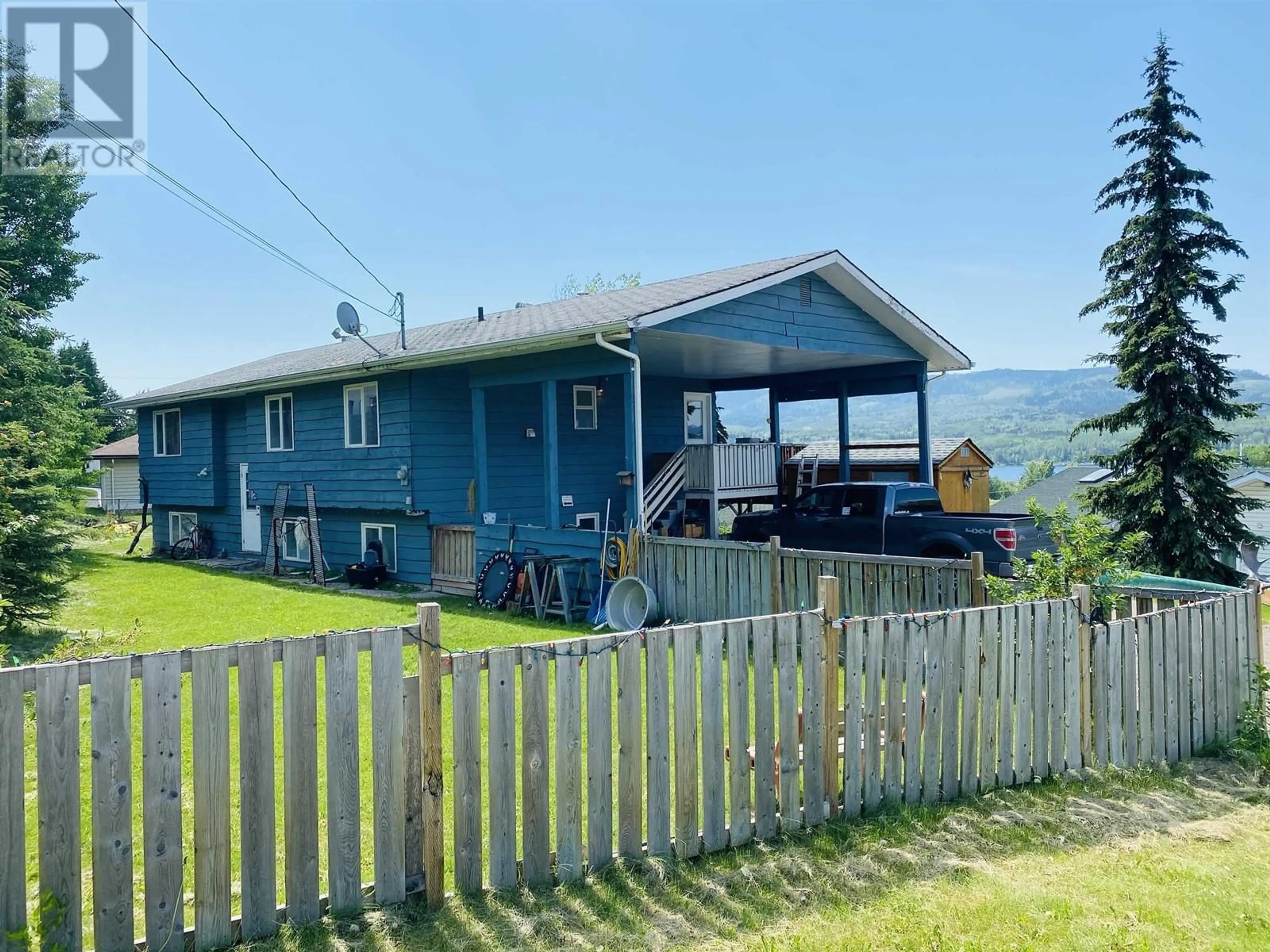 A pic from outside/outdoor area/front of a property/back of a property/a pic from drone, mountain view for 110 5TH AVENUE, Burns Lake British Columbia V0J1E0
