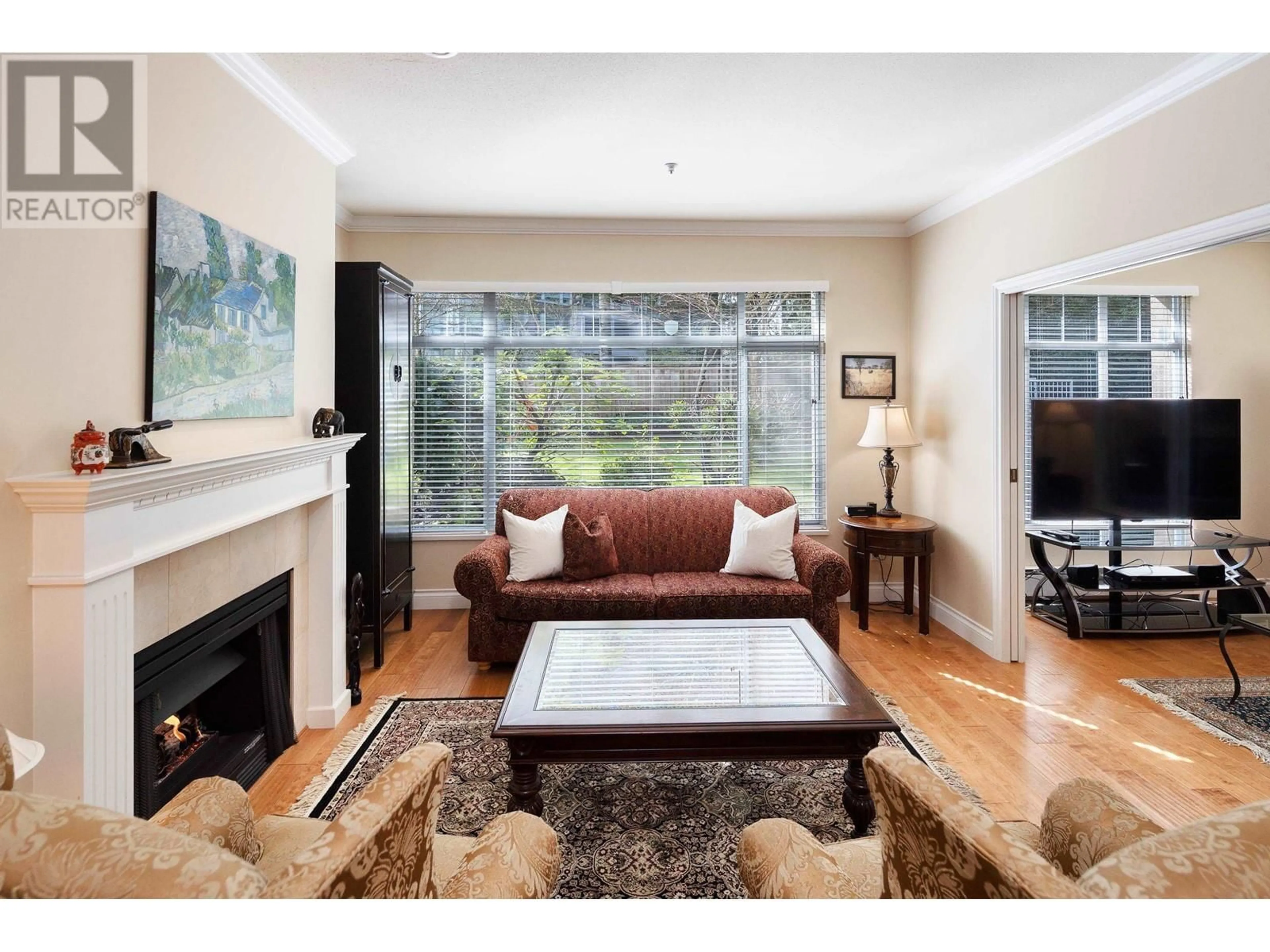 Living room with furniture, wood/laminate floor for 125 - 5735 HAMPTON PLACE, Vancouver British Columbia V6T2G8