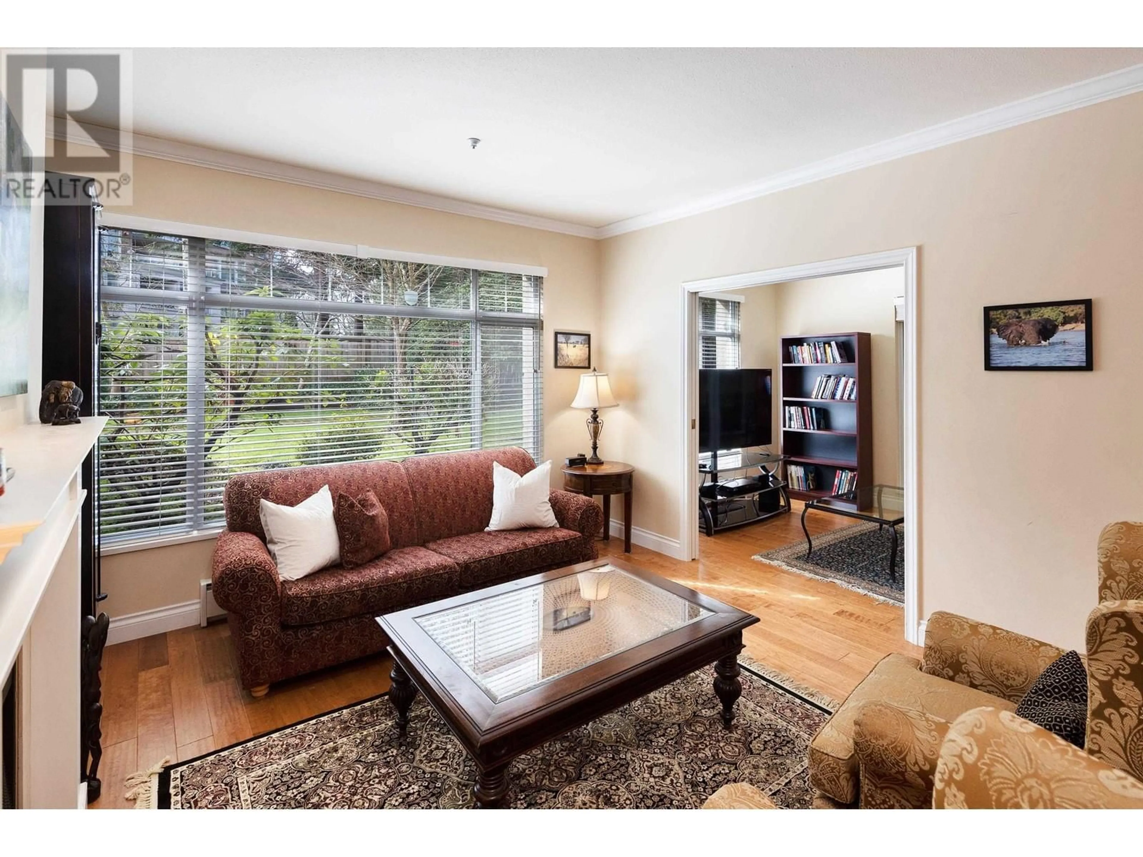 Living room with furniture, wood/laminate floor for 125 - 5735 HAMPTON PLACE, Vancouver British Columbia V6T2G8